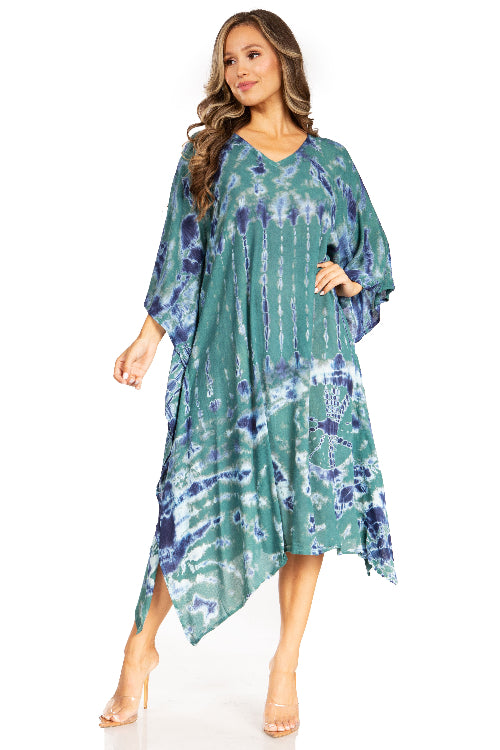 Woman wearing a green and blue tie-dye dress on a white background