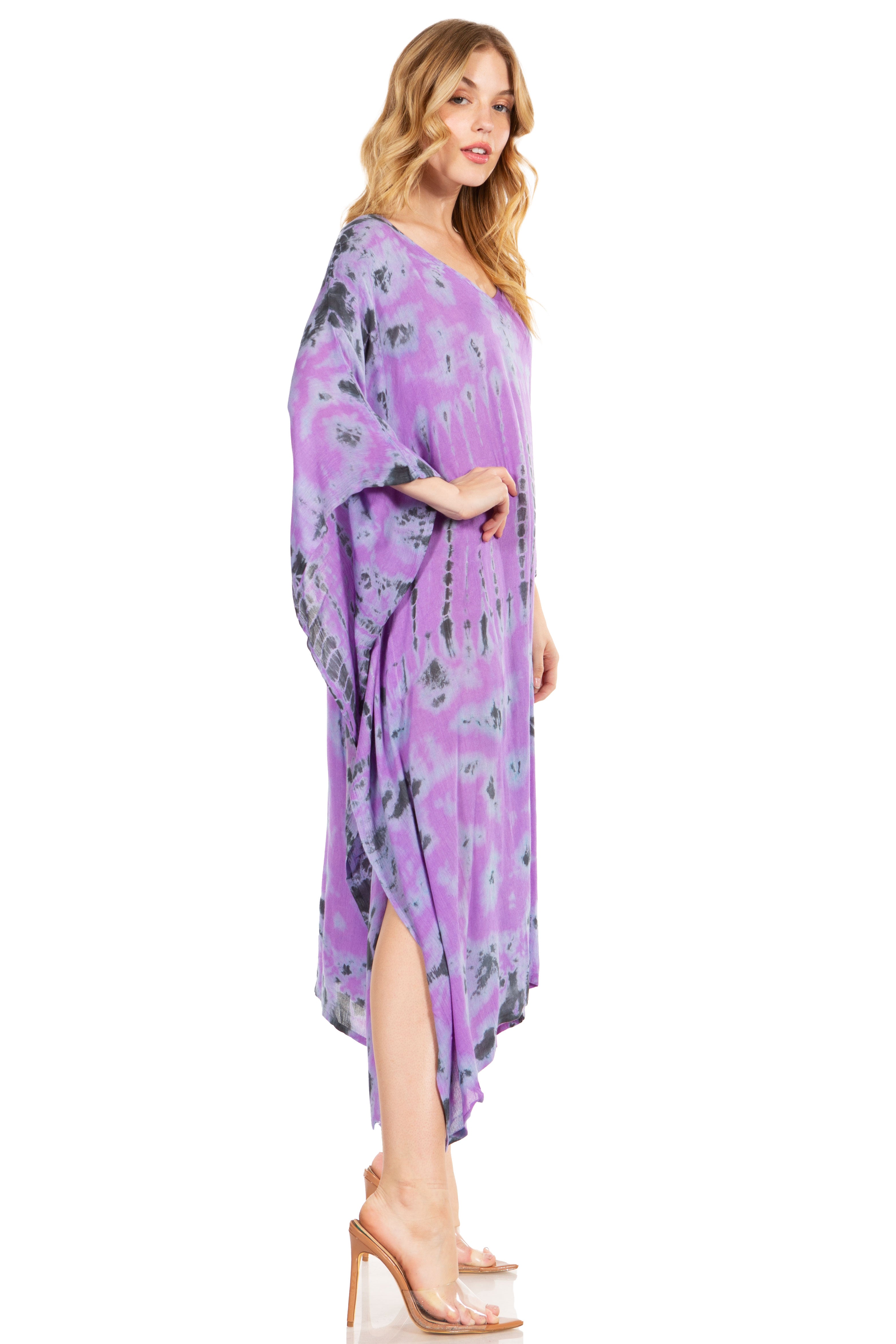 Woman wearing a purple floral dress on a white background