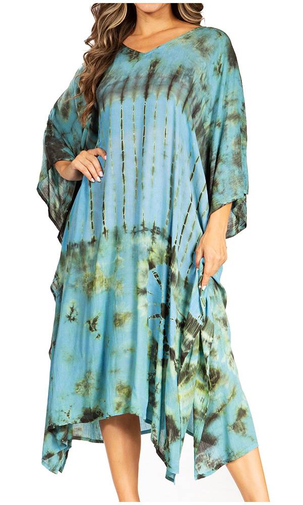 Woman wearing a blue and green tie-dye dress on a white background