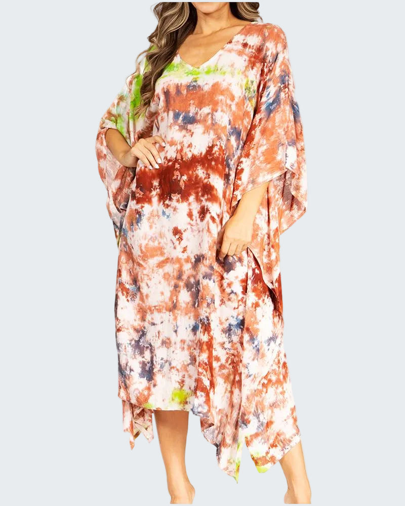 Woman wearing a colorful tie-dye dress on a white background