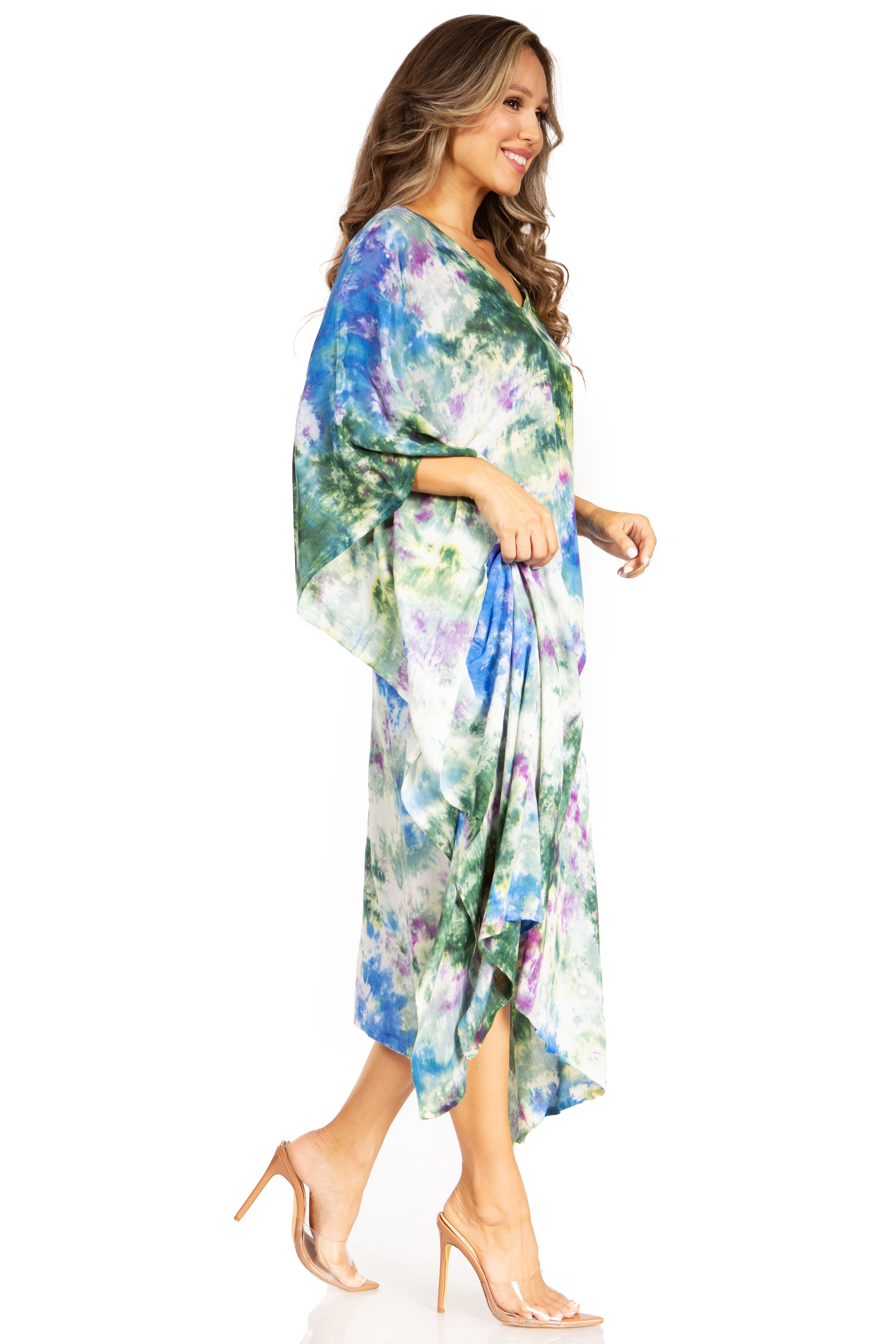 Woman wearing a floral kimono-style dress on a white background