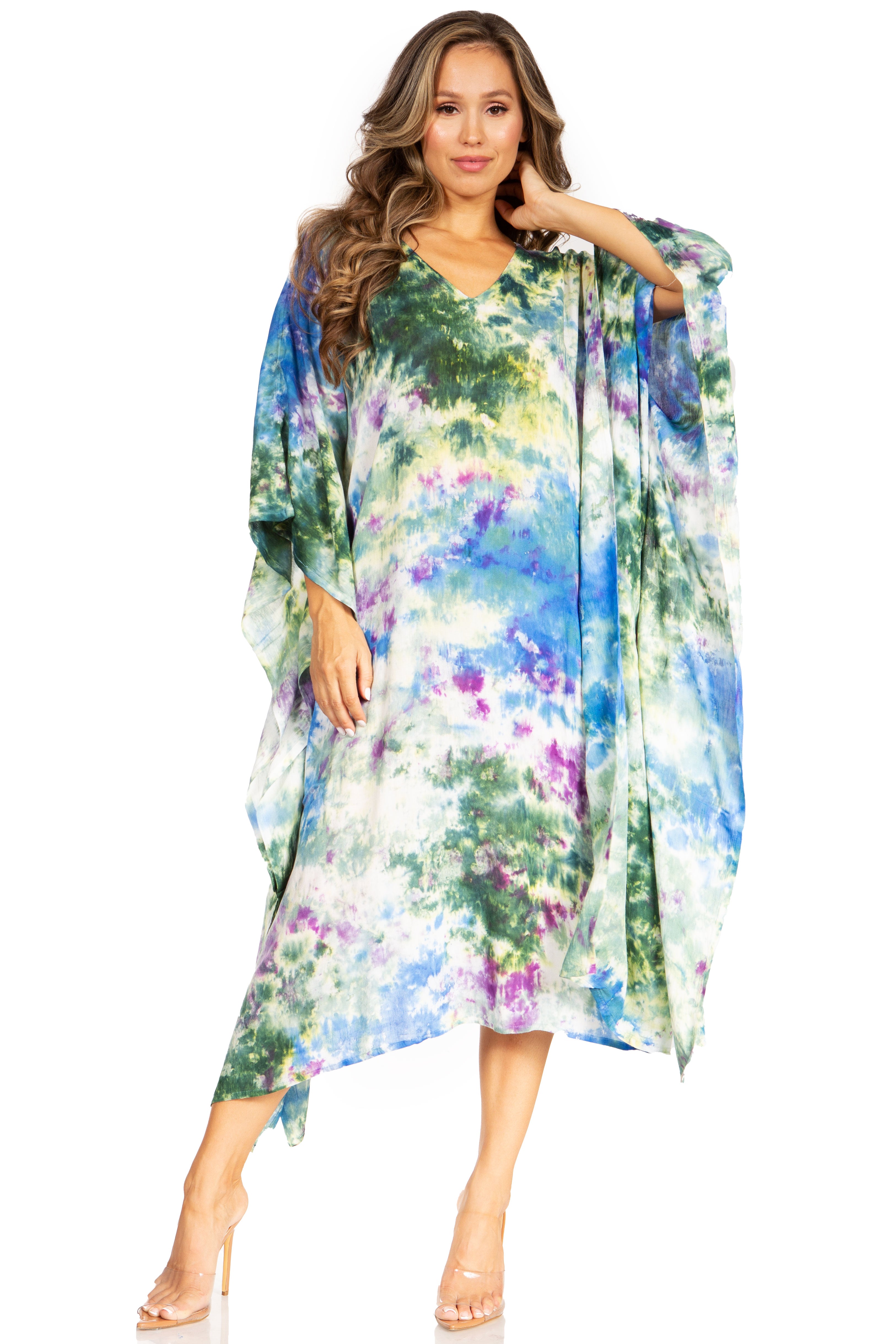 Woman wearing a colorful floral kimono-style garment on a white background