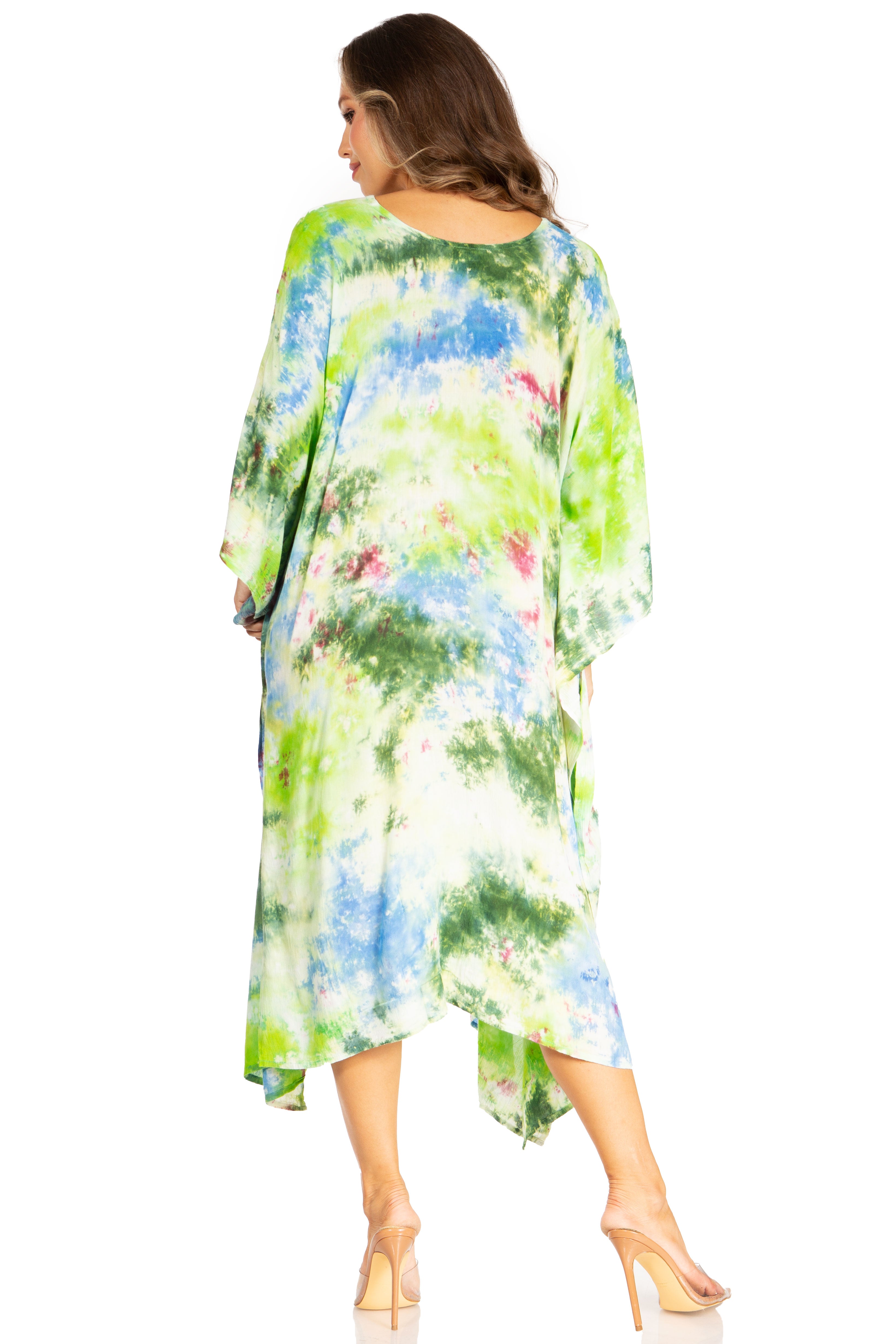 Woman wearing a colorful floral dress on a white background