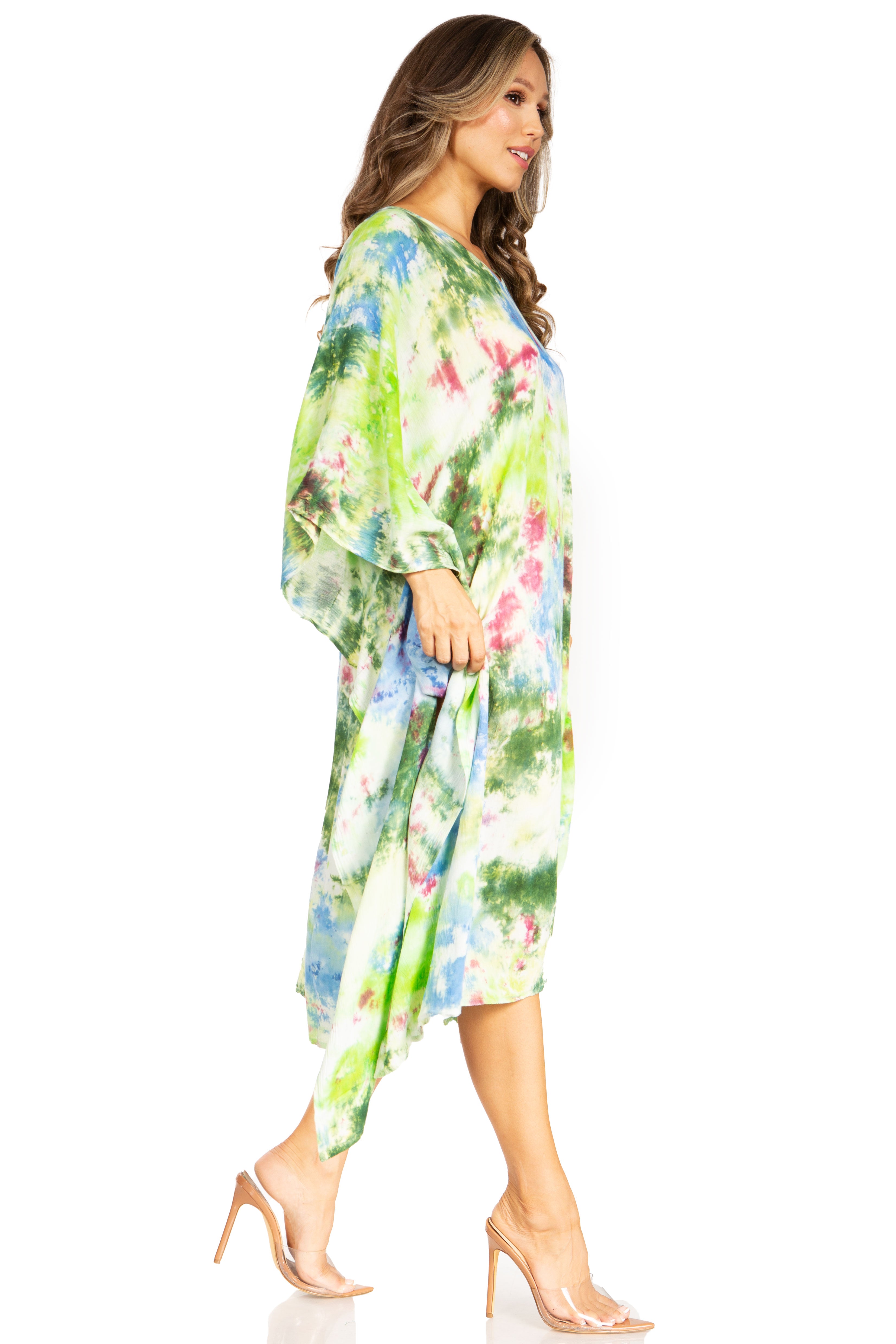 Woman wearing a colorful floral dress on a white background