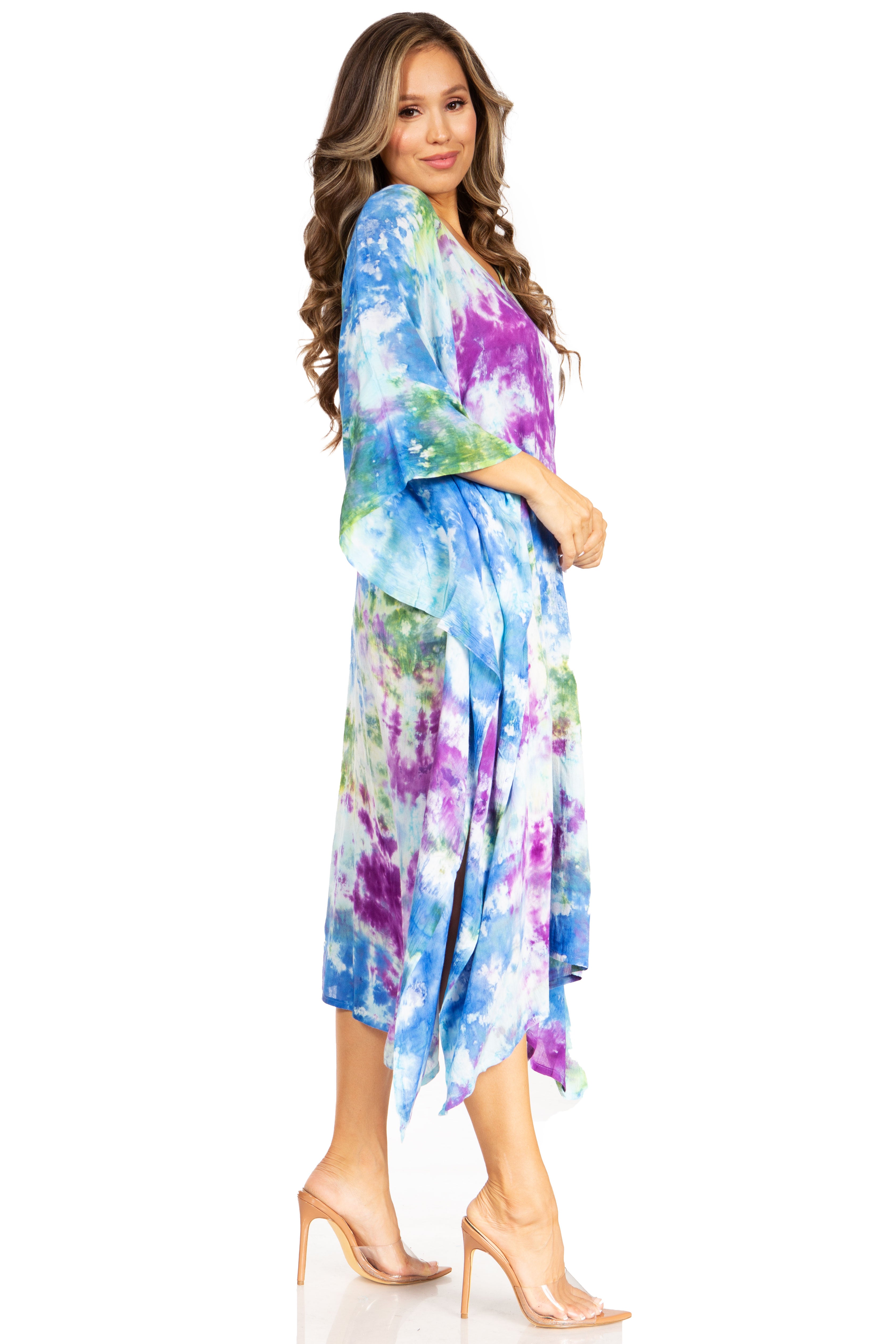 Woman wearing a colorful kimono-style dress on a white background