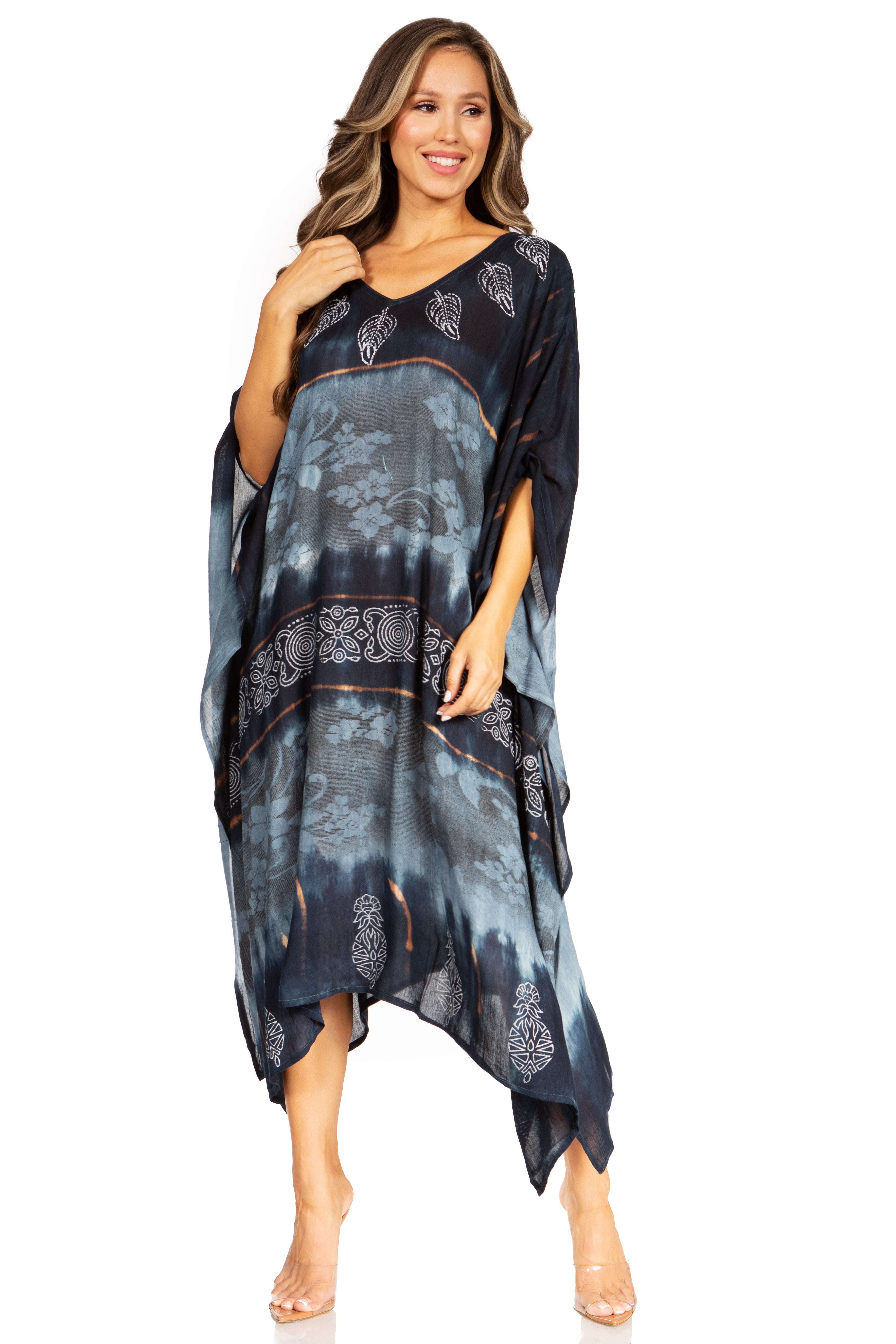 Woman wearing a blue patterned dress on a white background