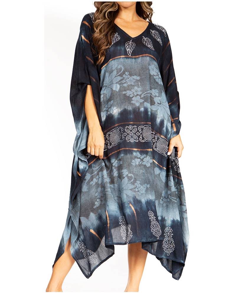 Woman wearing a blue and black patterned dress on a white background
