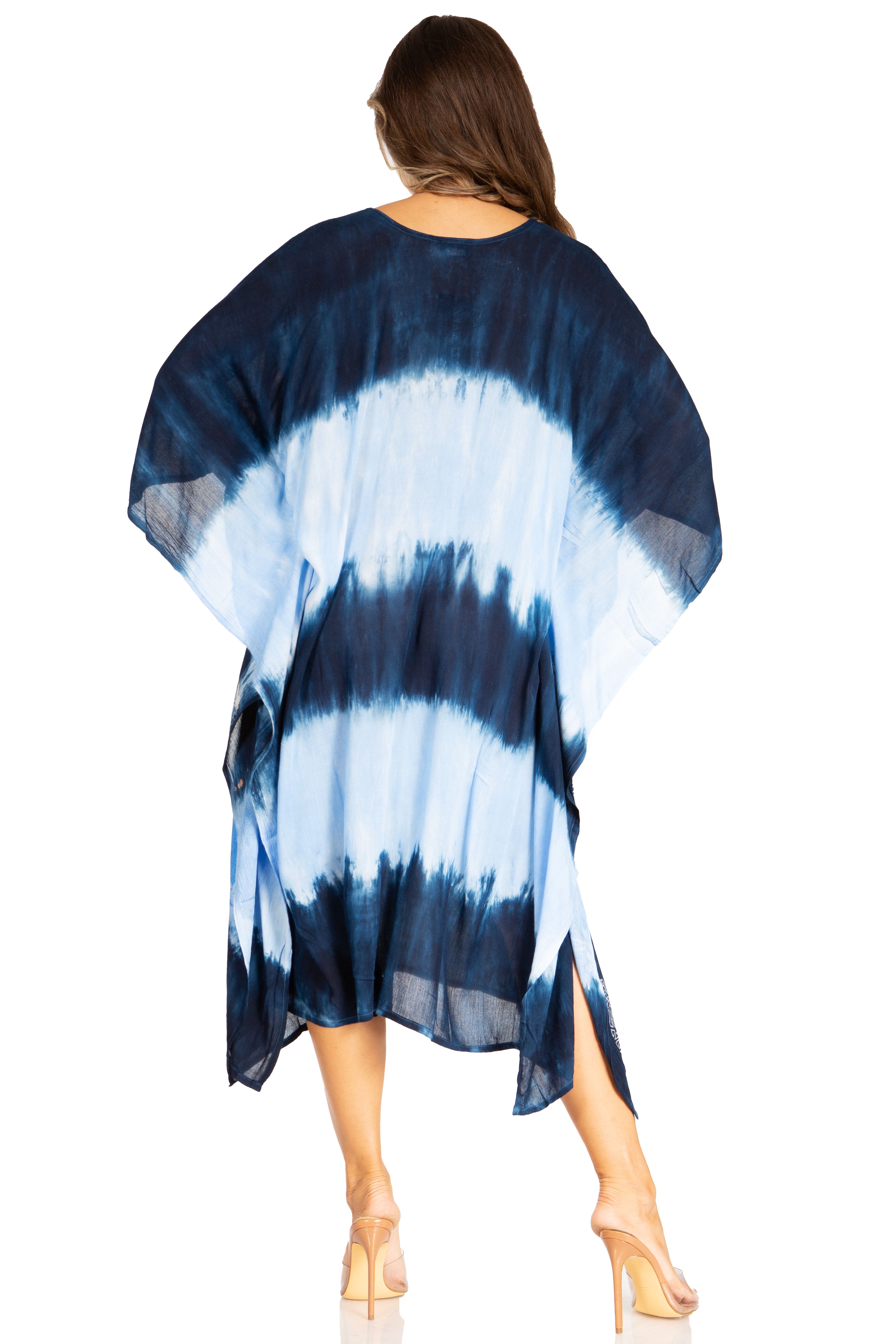 Woman wearing a blue and white tie-dye kimono-style garment on a white background