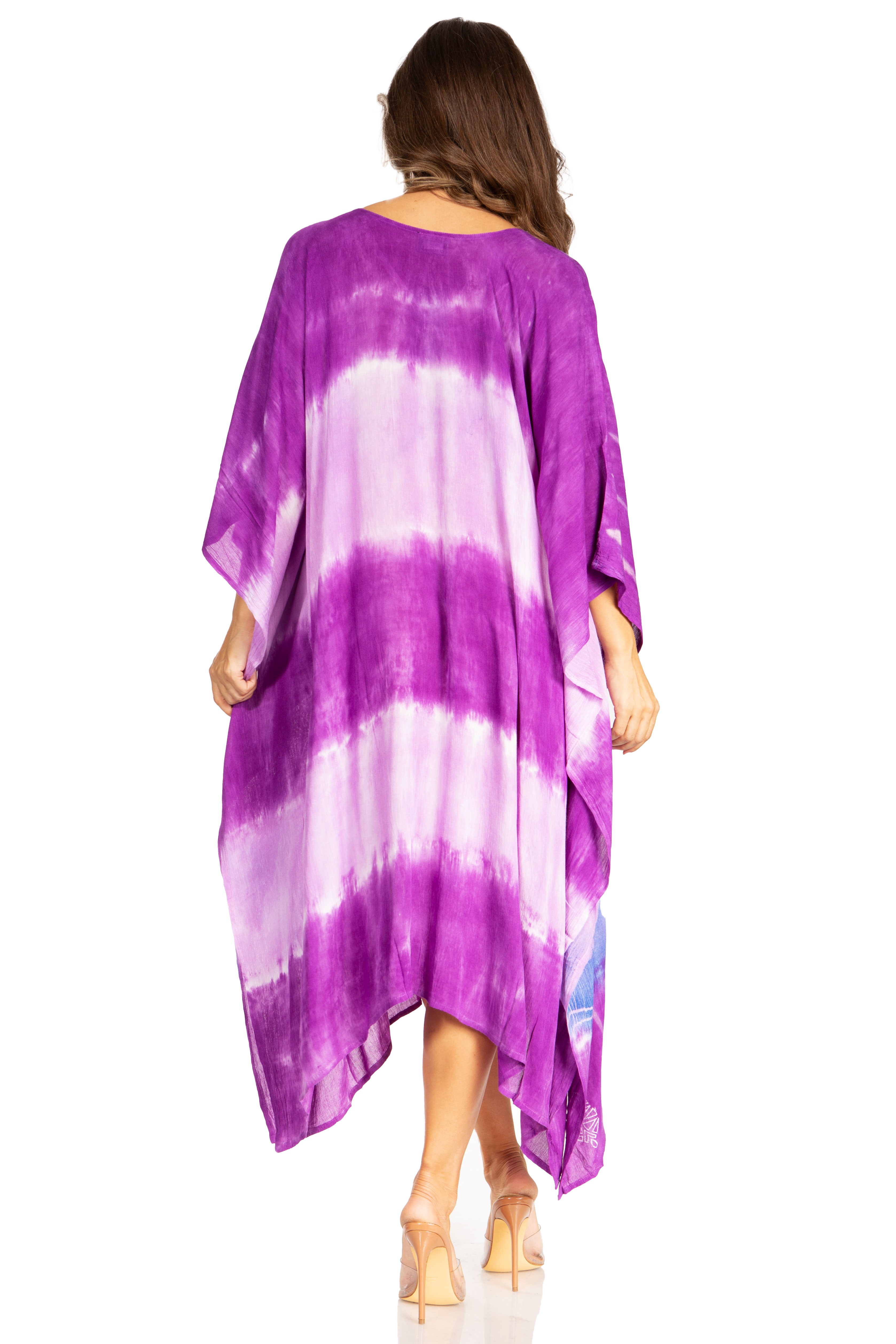 Purple and white tie-dye dress worn by a person on a white background