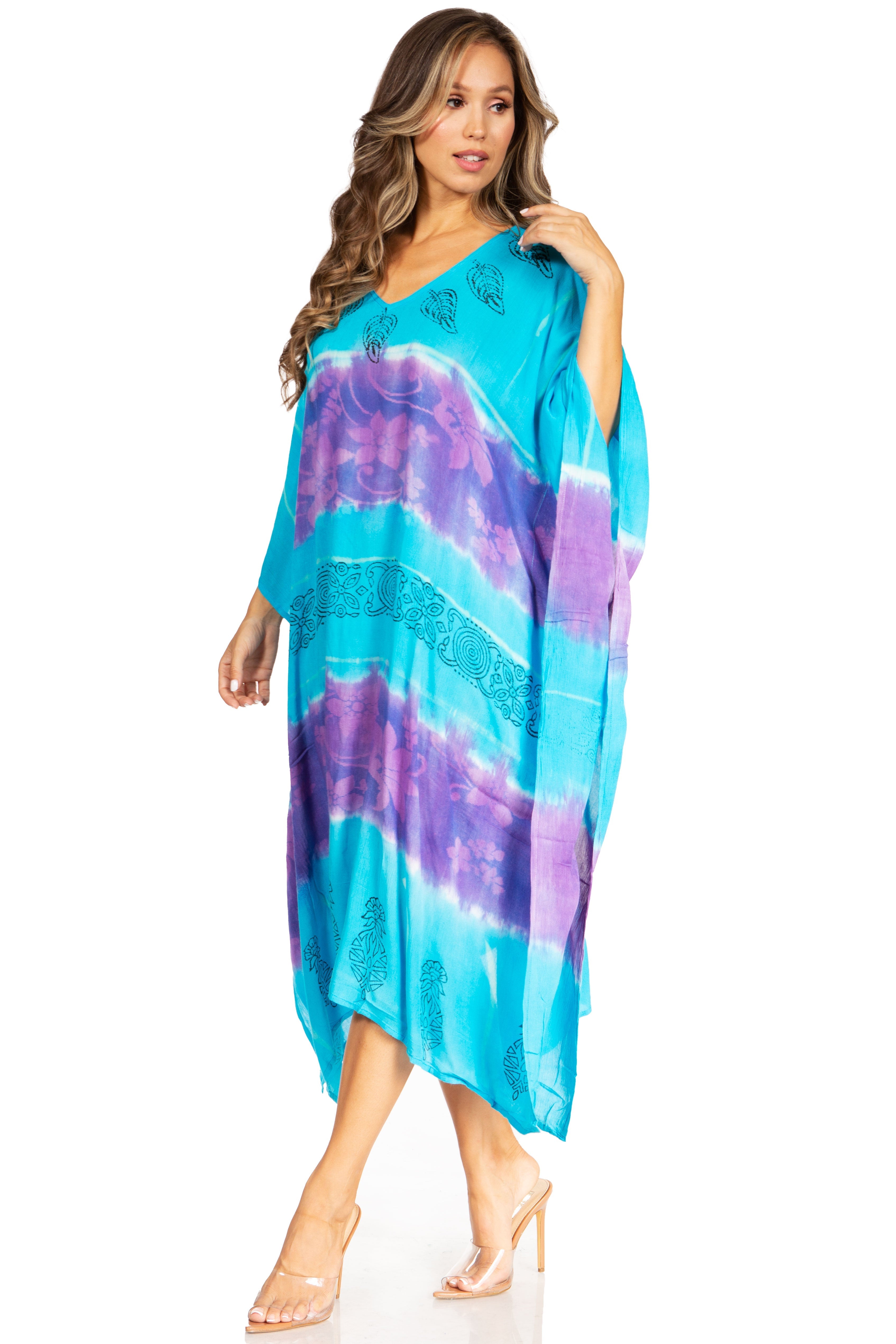 Woman wearing a blue and purple tie-dye dress on a white background