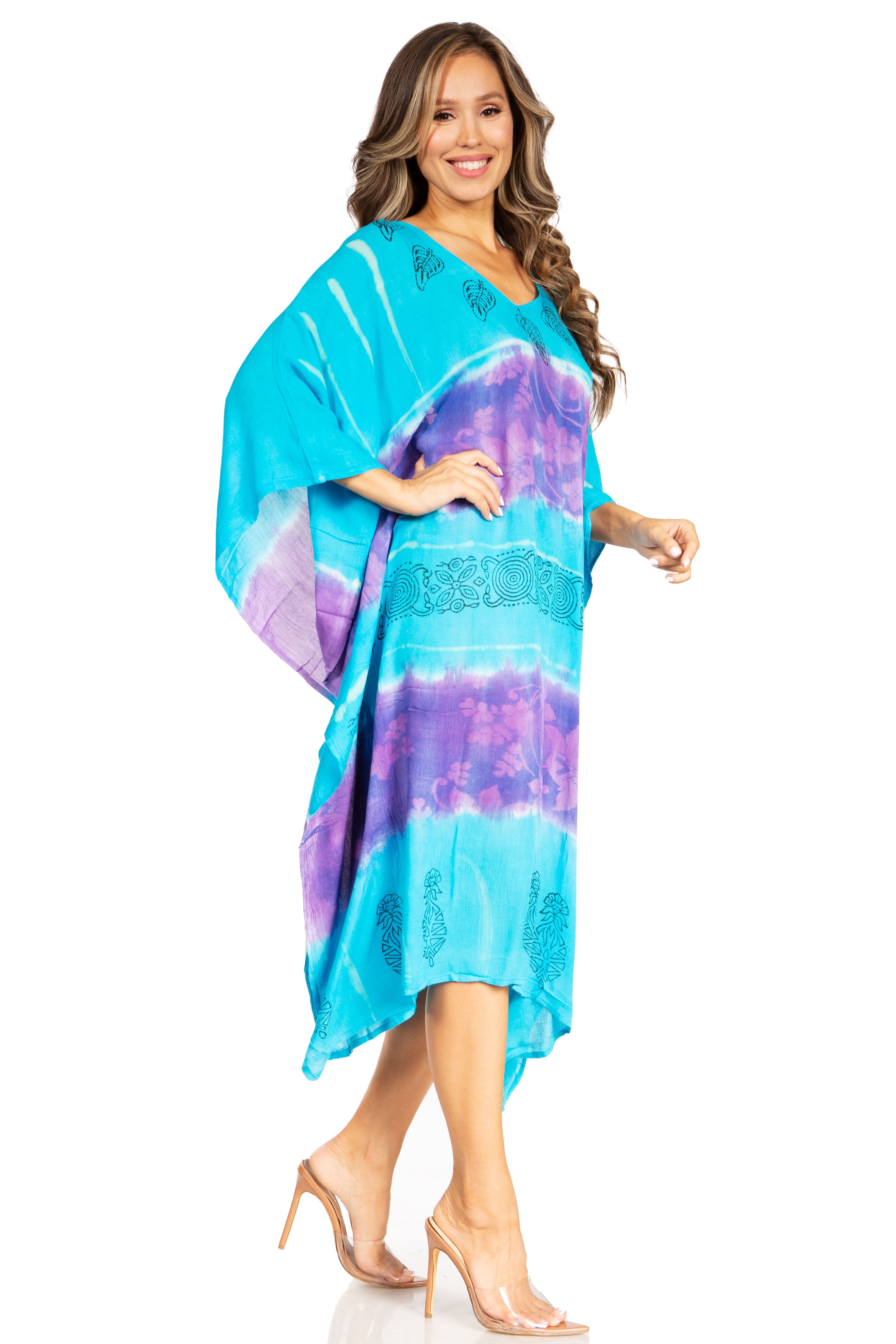 Woman wearing a colorful dress with a white background