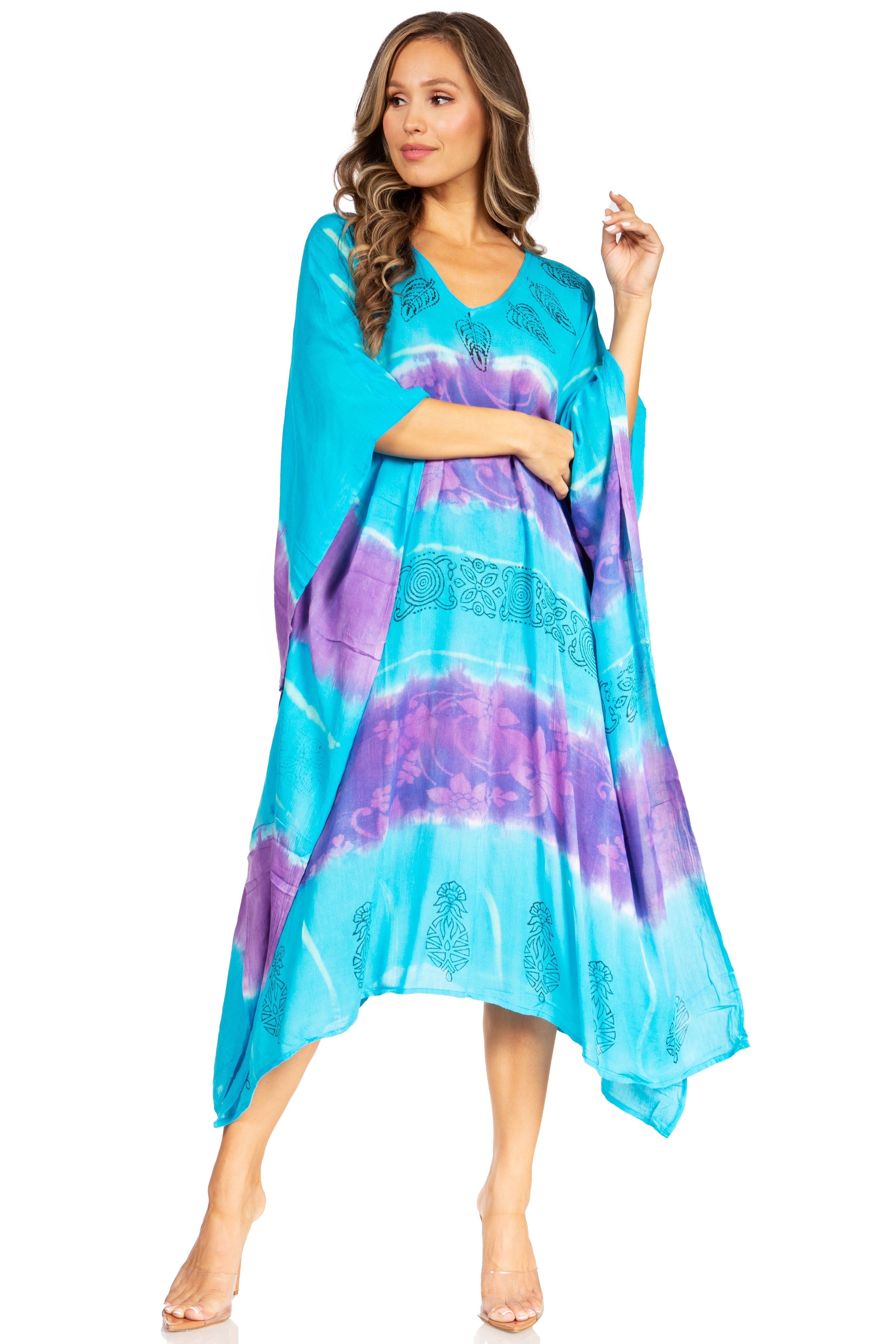 Woman wearing a blue and purple tie-dye dress on a white background