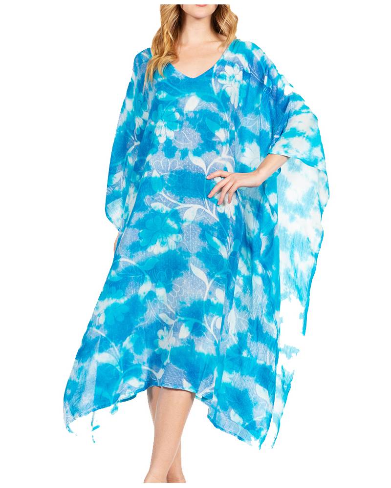 Woman wearing a blue and white floral patterned kaftan on a white background
