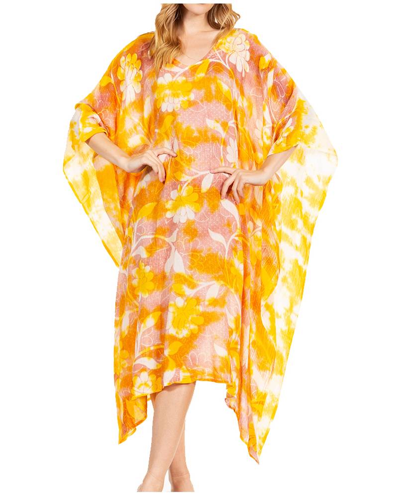 Woman wearing a yellow and pink floral caftan on a white background