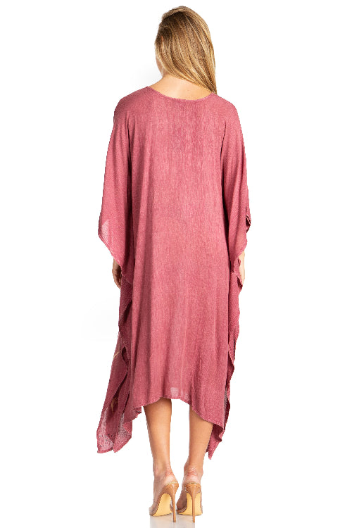 Pink dress worn by a person on a white background