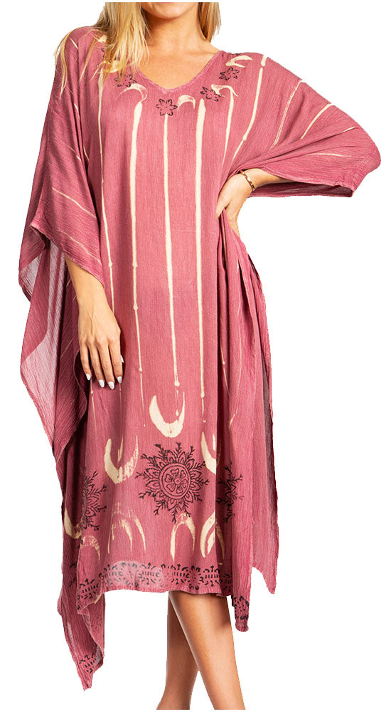 Pink dress with white patterns on a white background