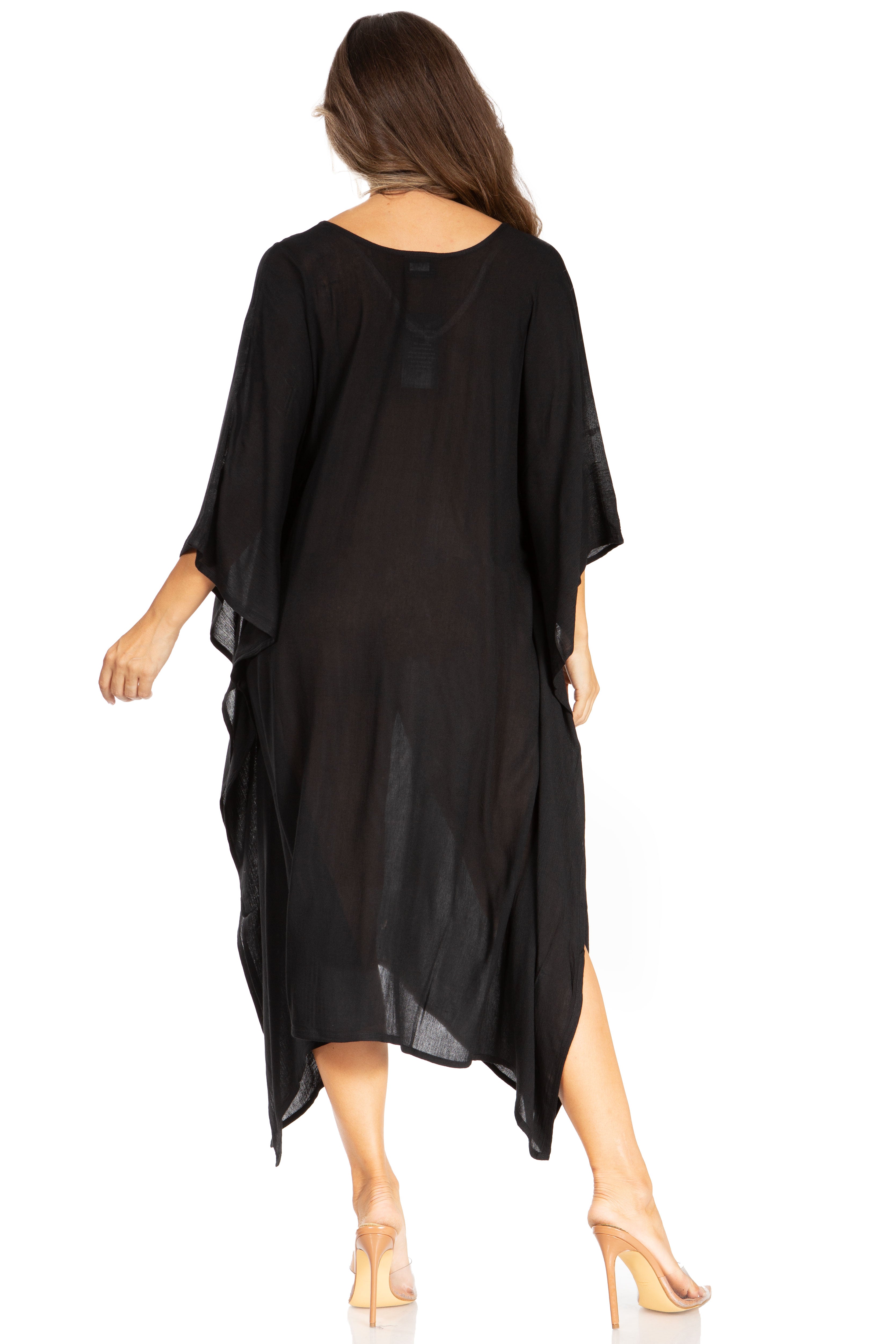 Black dress with a draped design on a white background