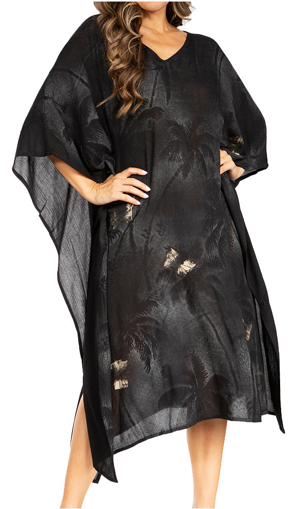 Black floral patterned dress worn by a model on a white background