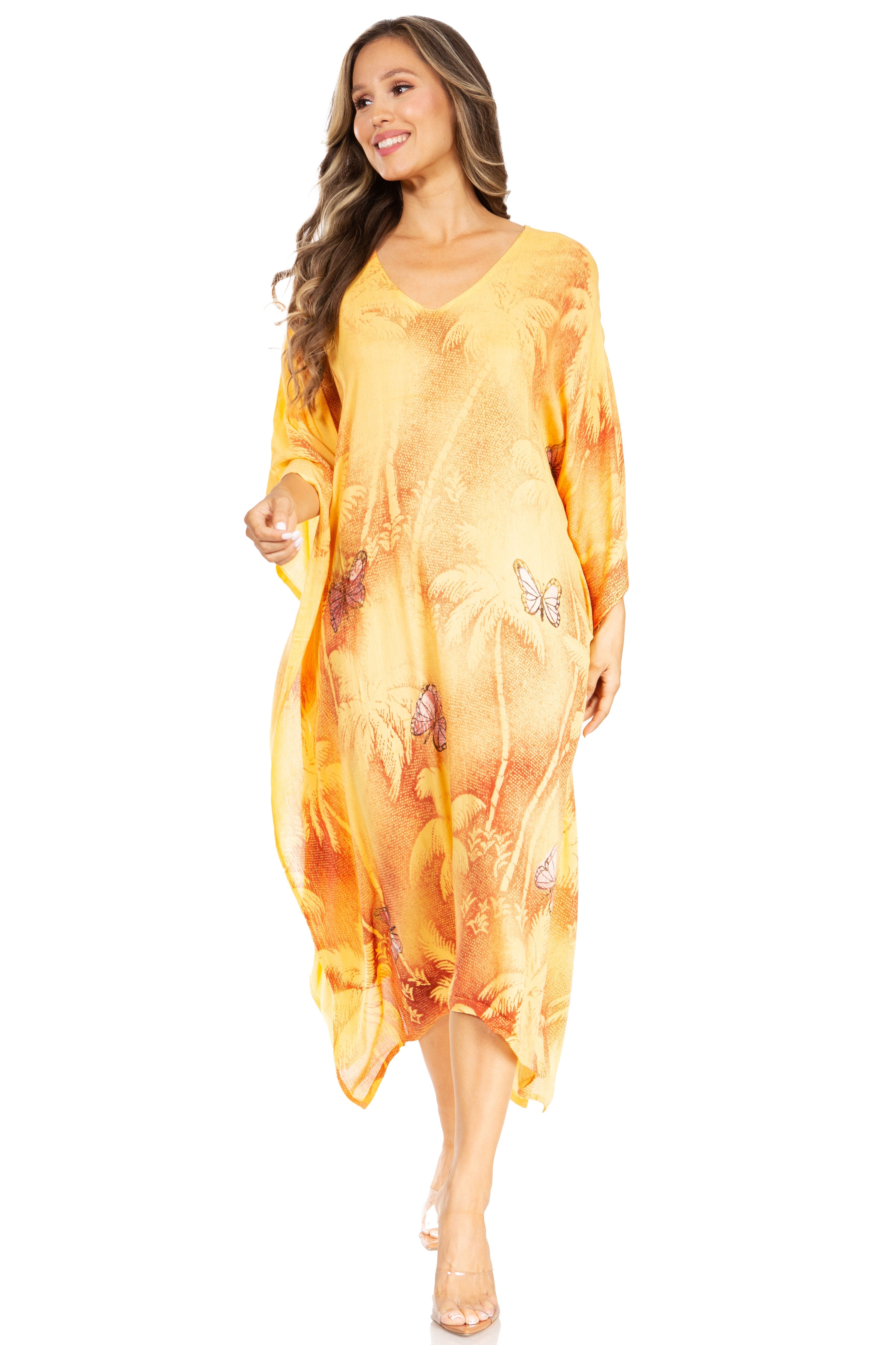 Woman wearing a yellow butterfly-patterned dress on a white background