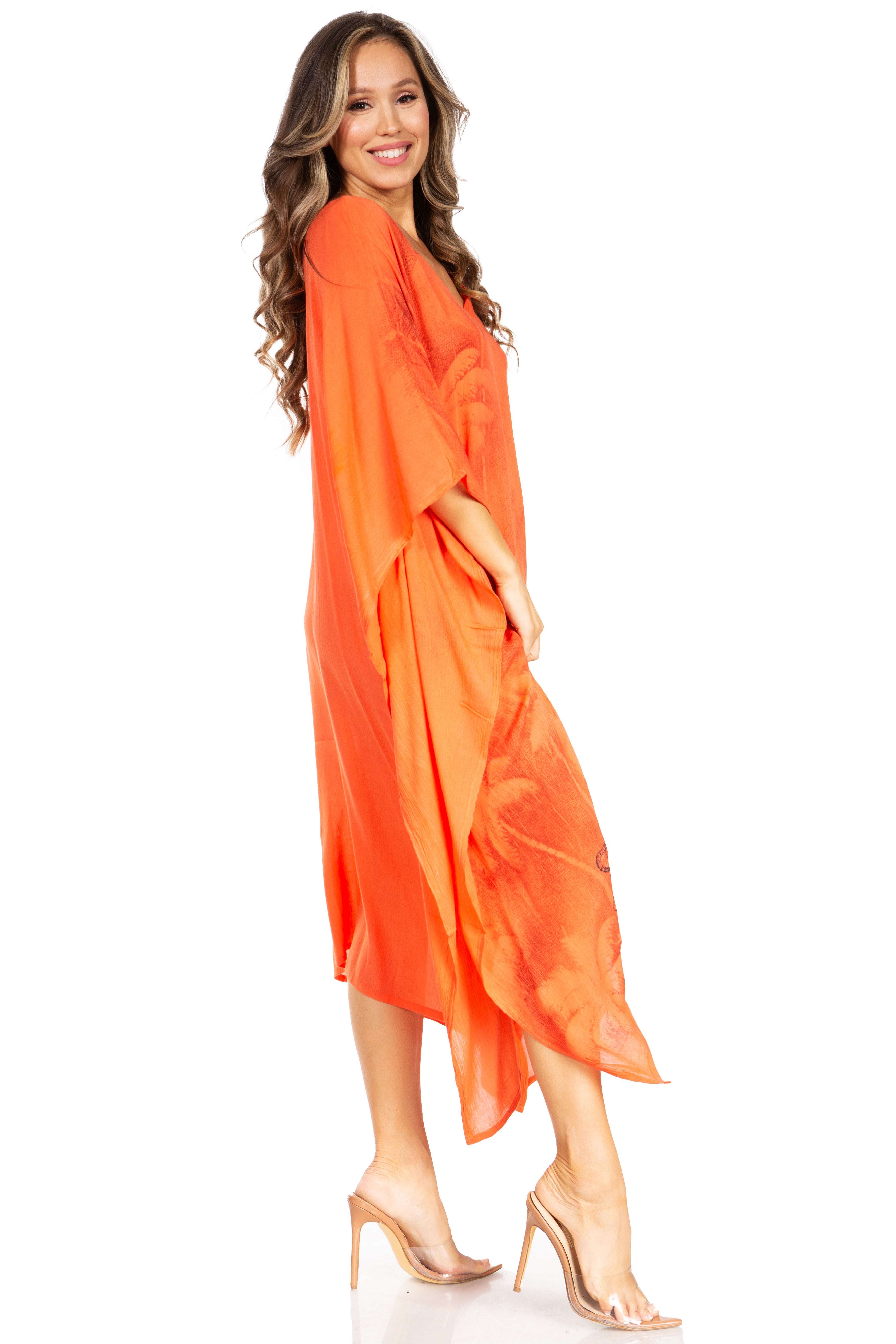 Woman wearing an orange dress on a white background