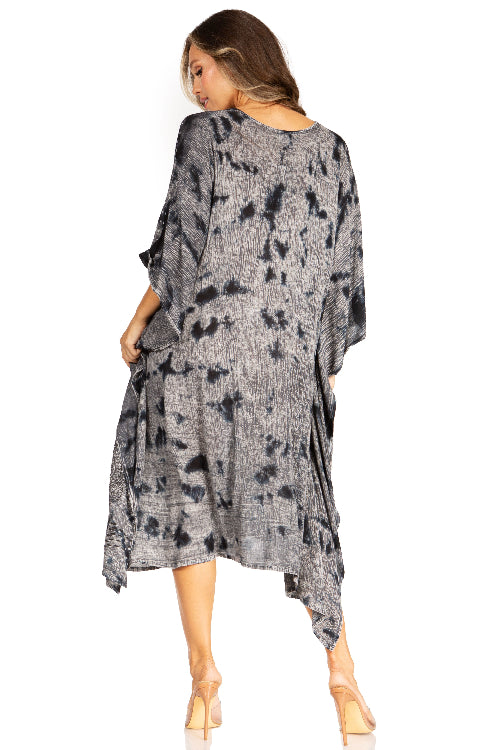 Woman wearing a gray floral patterned dress on a white background