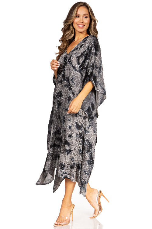 Woman wearing a gray floral patterned dress on a white background