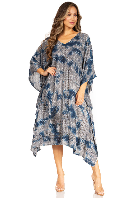Woman wearing a blue floral dress on a white background