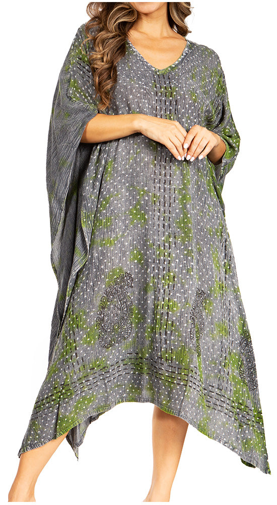 Woman wearing a gray floral dress with a white background
