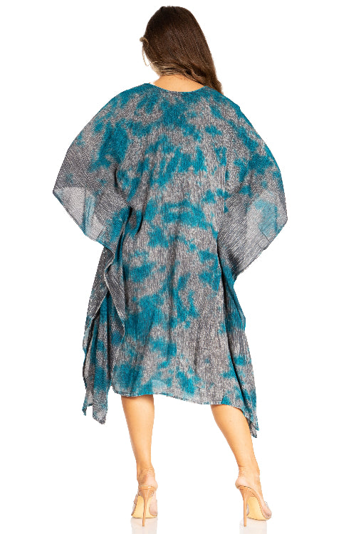 Woman wearing a blue and gray patterned kimono-style garment on a white background