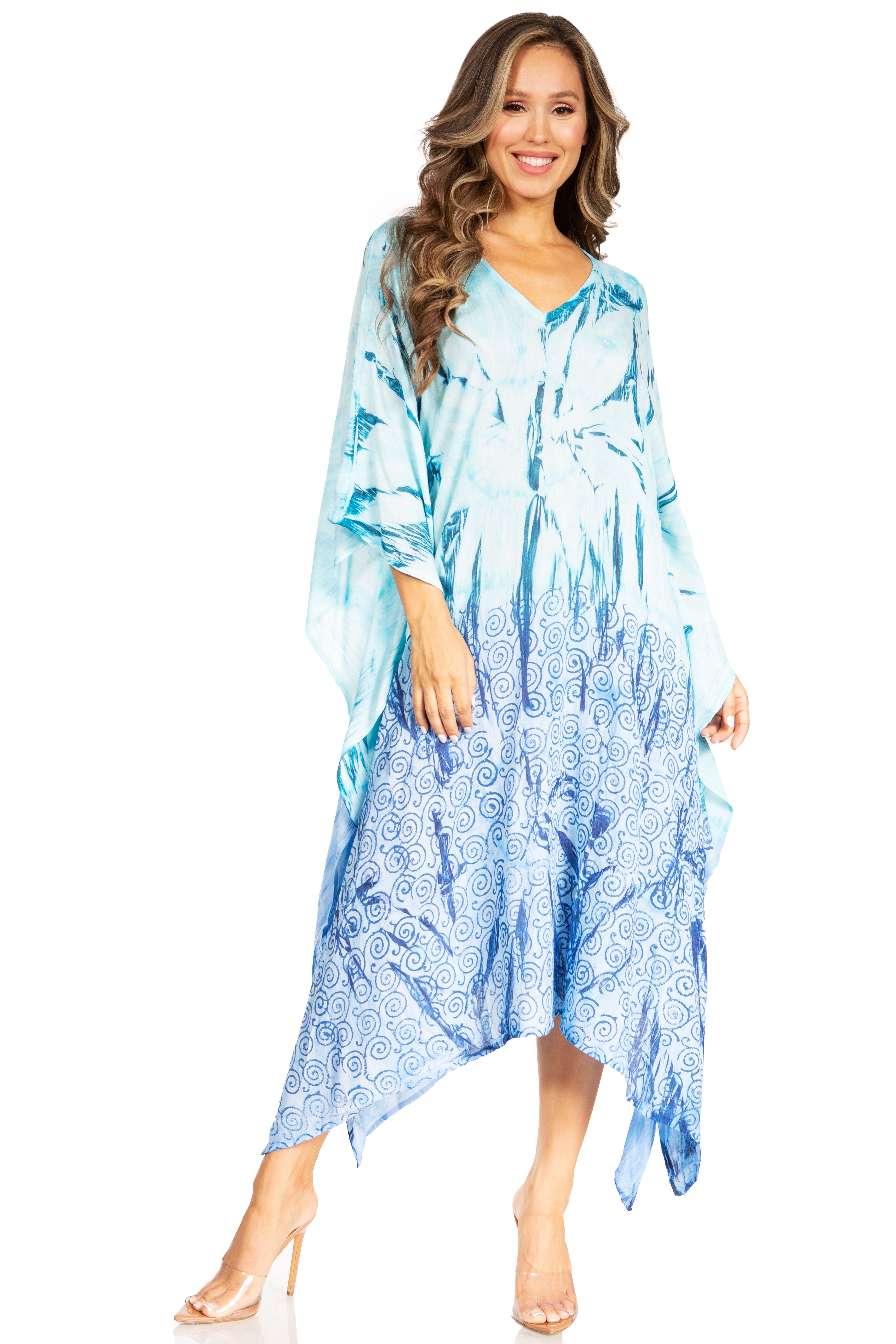 Woman wearing a blue patterned dress on a white background