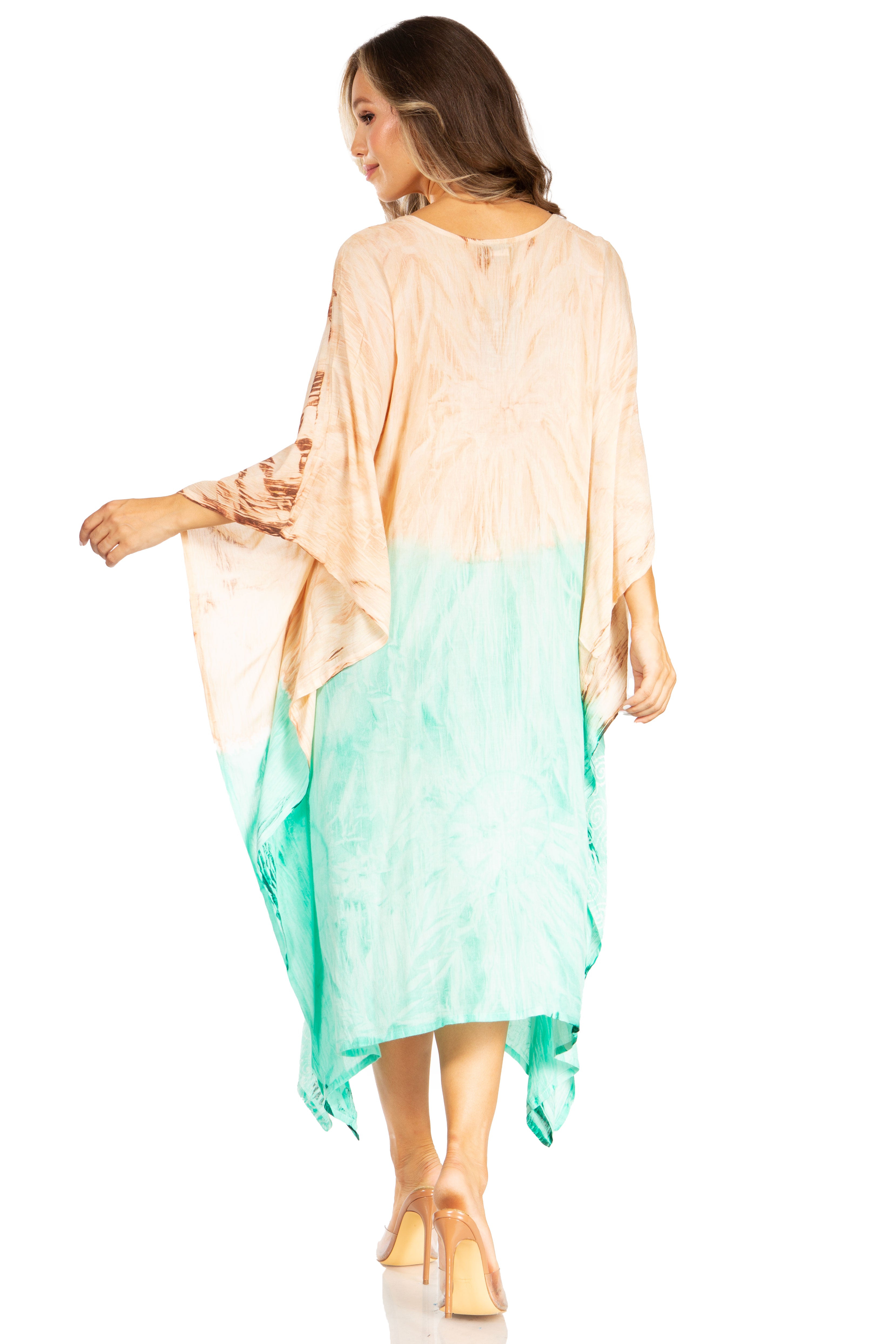 Woman wearing a beige and green gradient dress on a white background