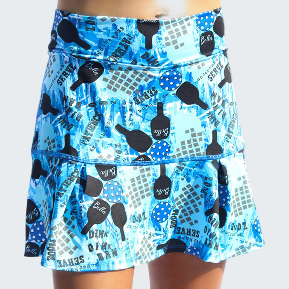 Blue tennis skirt with black paddle and text pattern on a white background