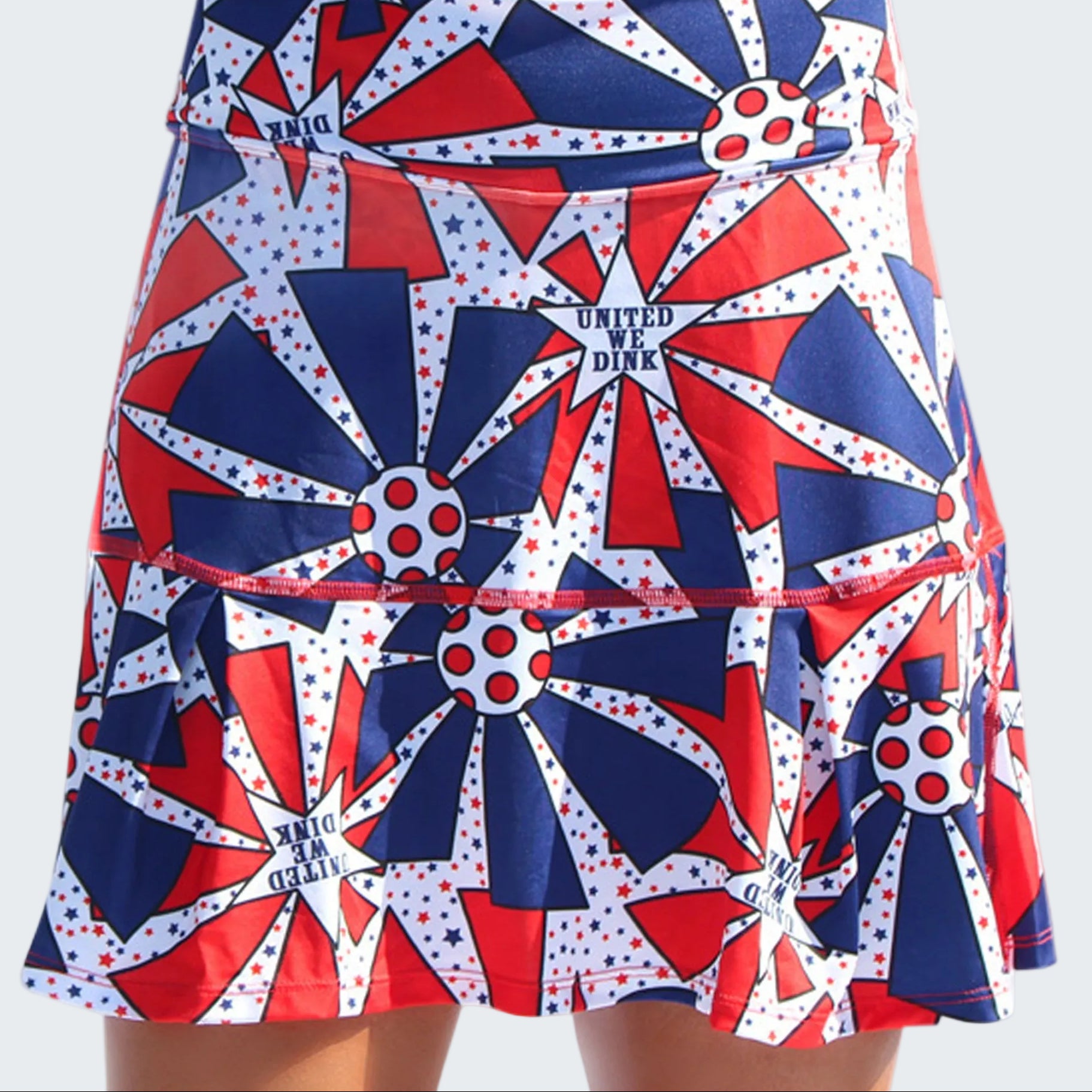 Skirt with red, white, and blue geometric pattern on a white background