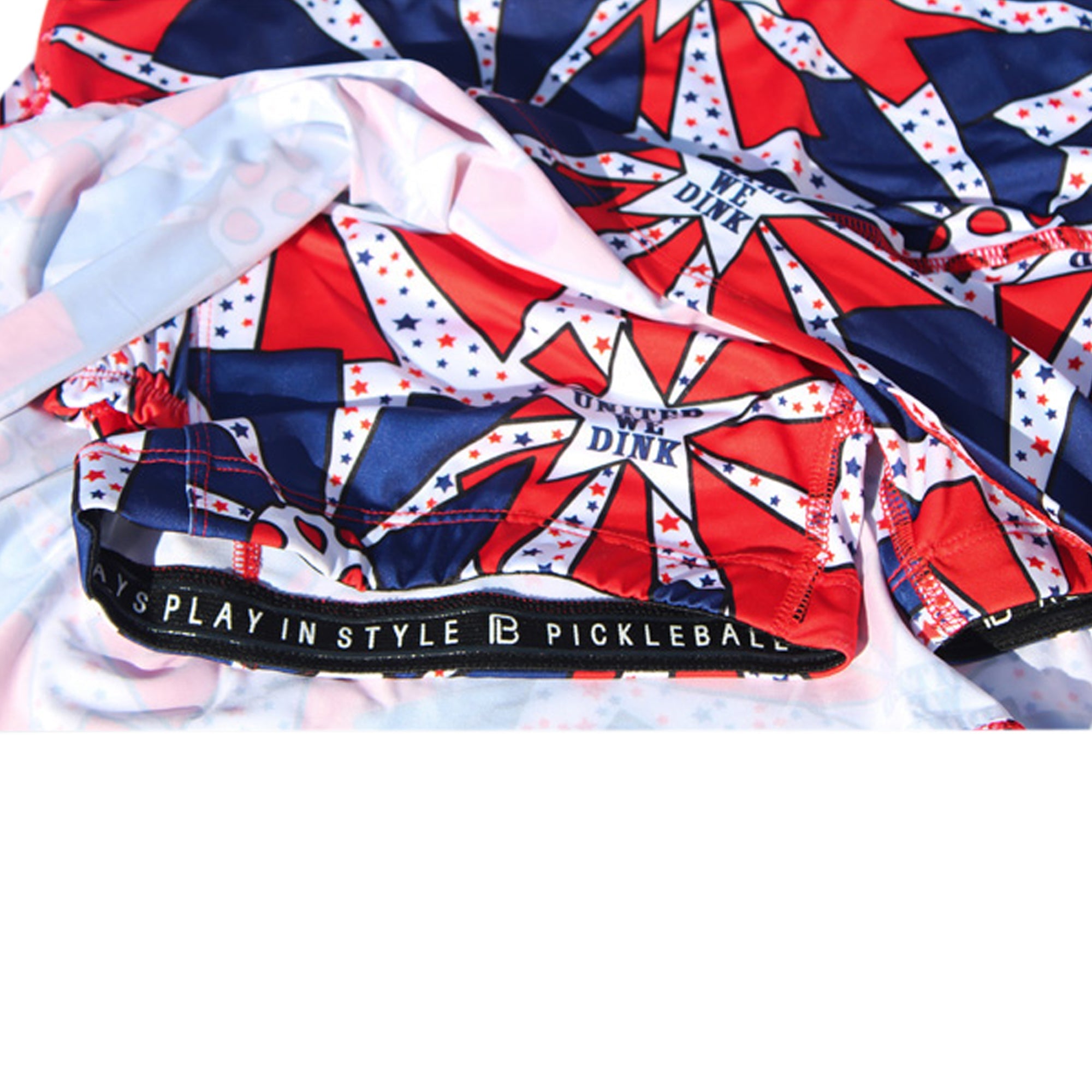 Pickleball paddle with red, white, and blue design on a white background