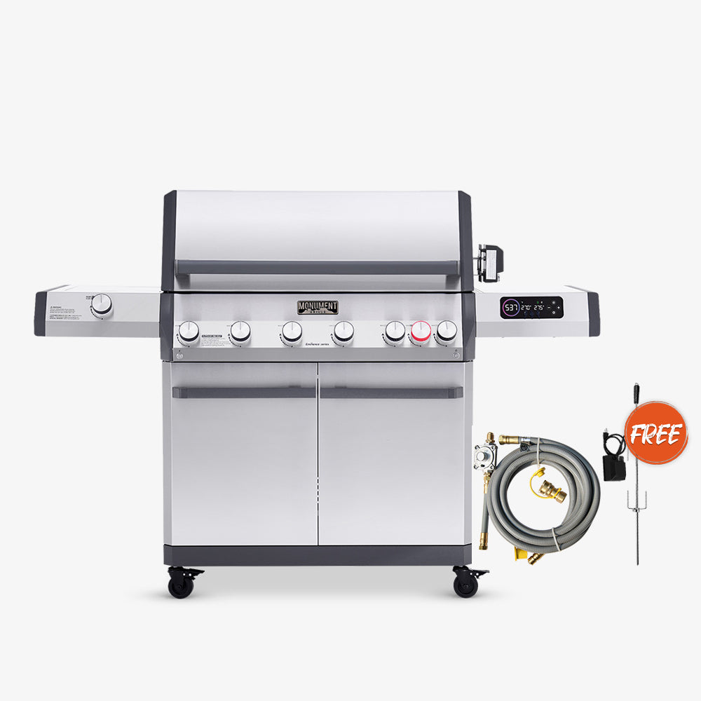 Stainless steel grill with accessories on a white background
