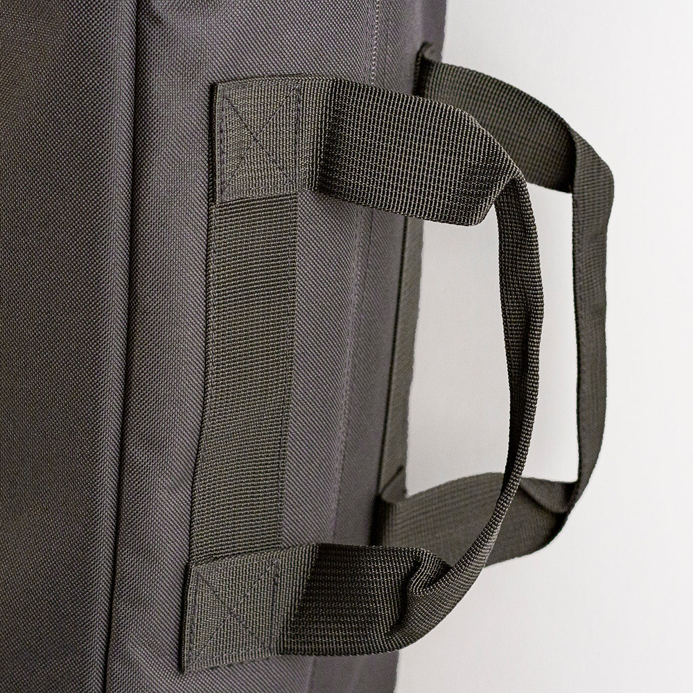 Close-up of a gray bag with a handle on a white background