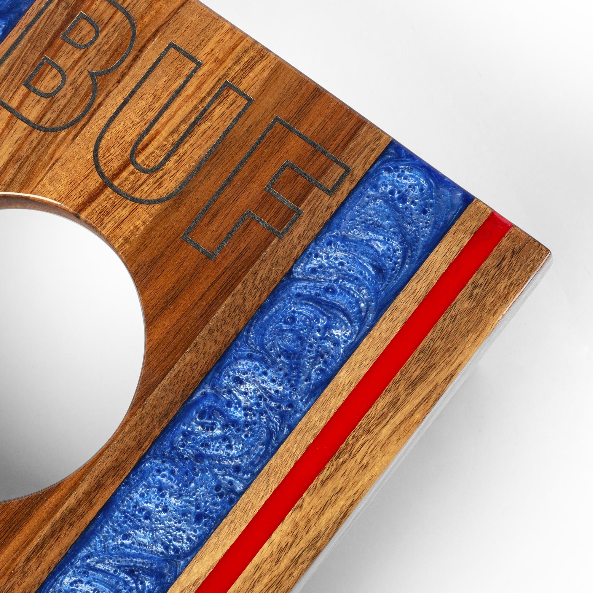 Wooden and resin product with 'BUF' branding on a white background