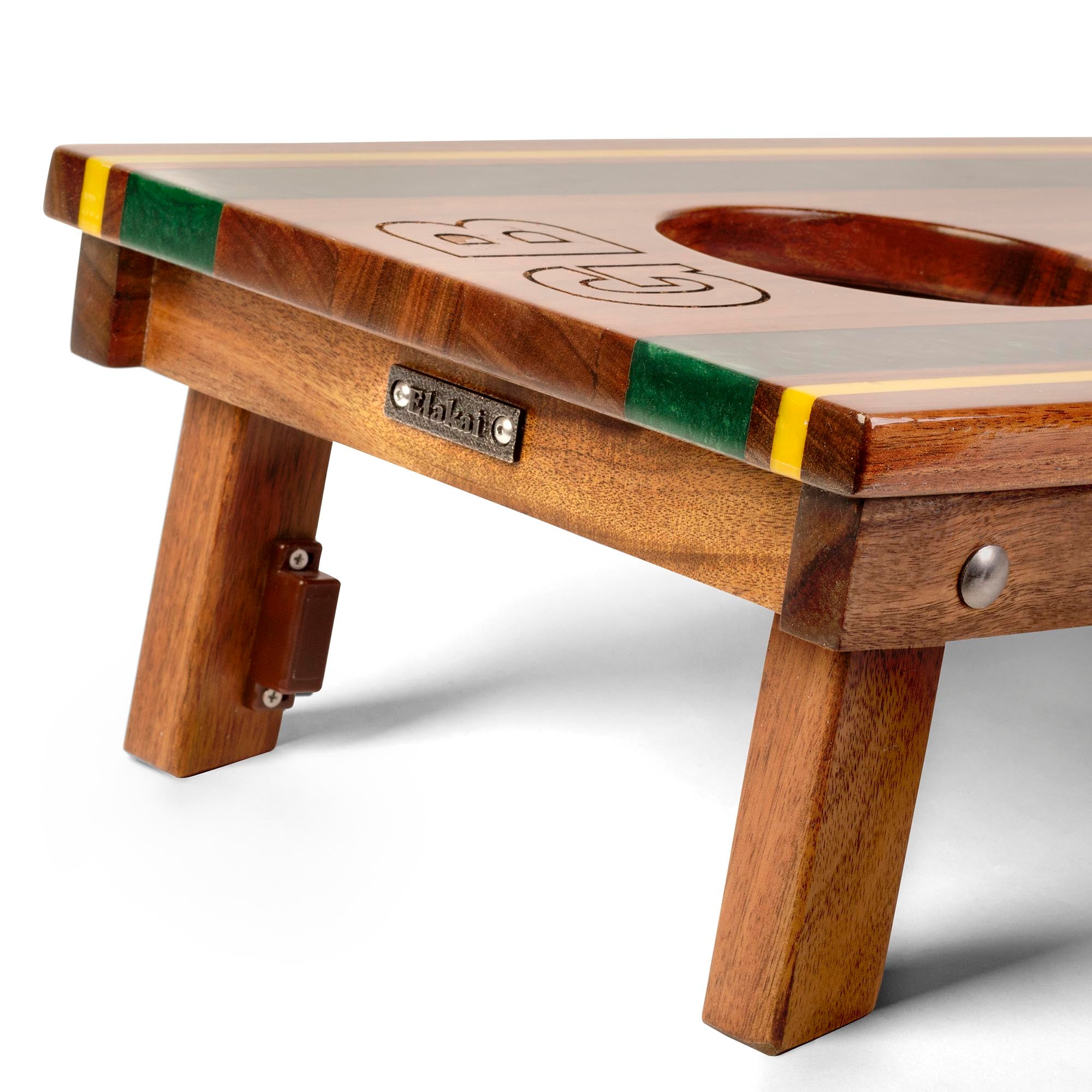Wooden beer pong table with green and yellow accents on a white background