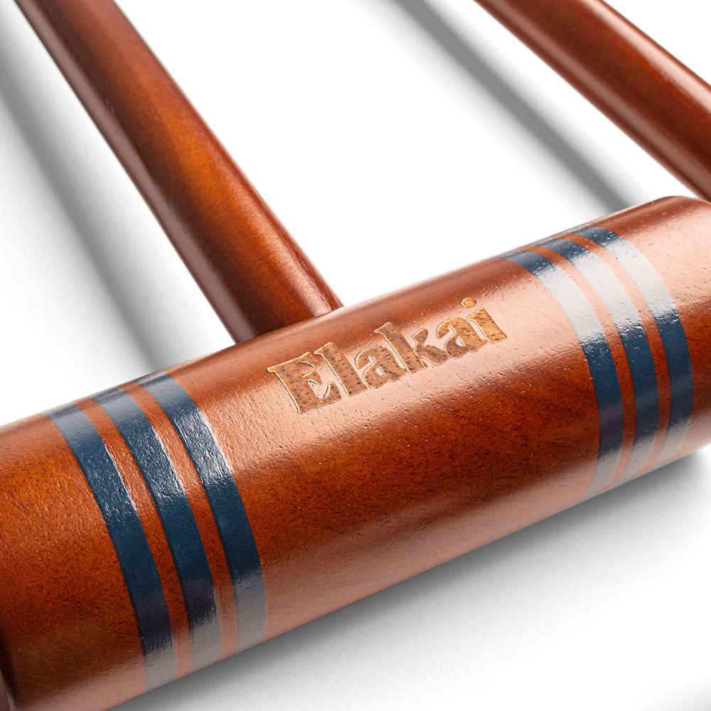 Close-up of a brown metal pipe with 'Blakai' branding on a white background