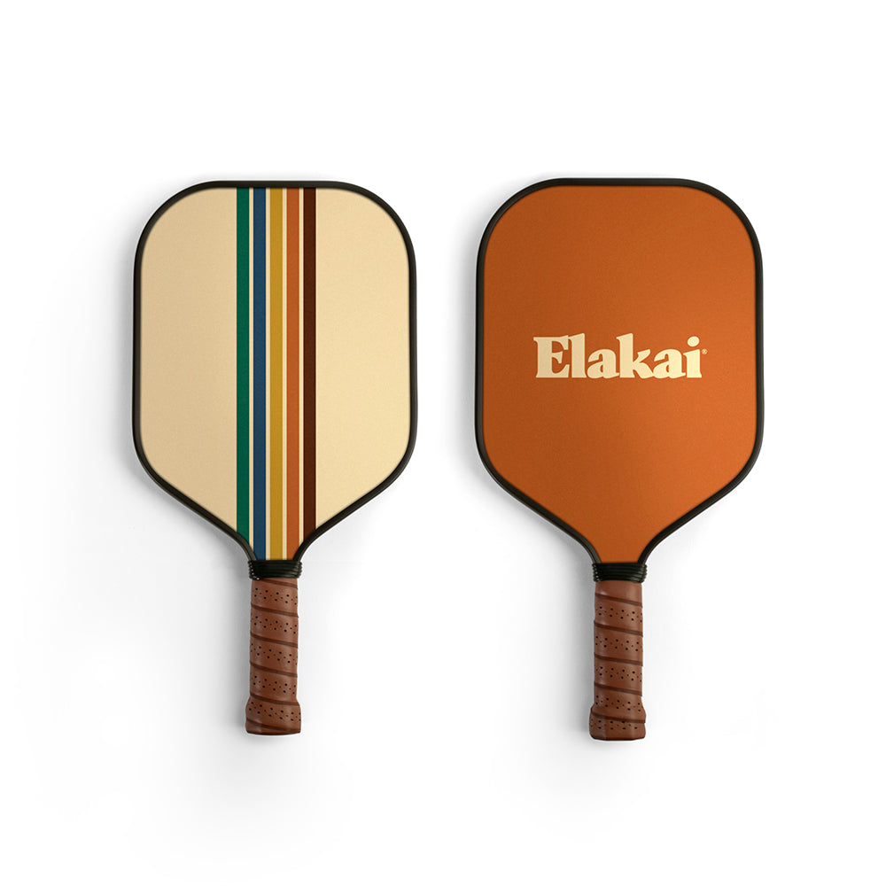 Two pickleball paddles with striped design and 'Elakai' branding on a white background