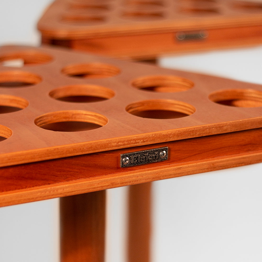 Wooden drink holder with multiple compartments on a white background