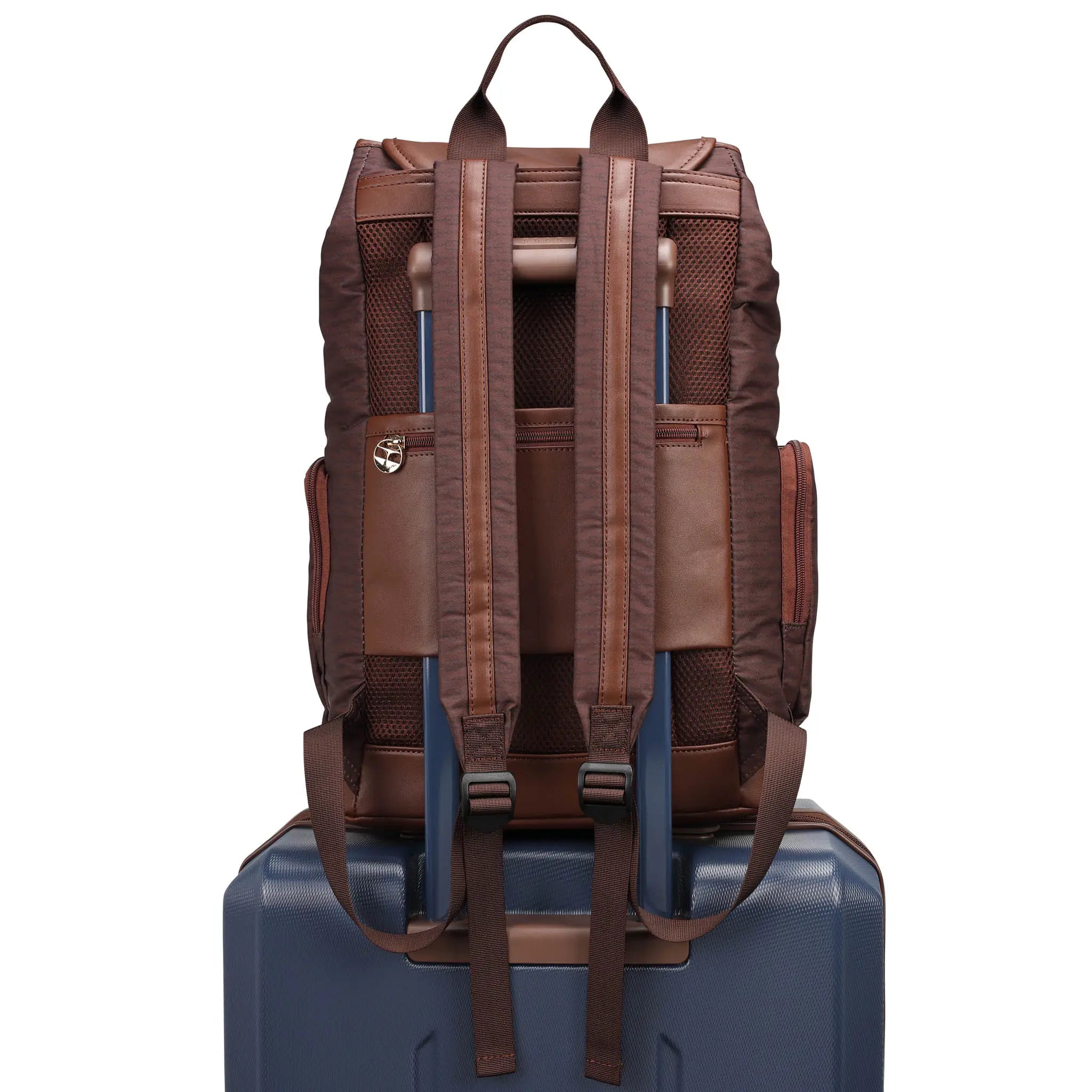 Brown backpack on a blue suitcase against a white background