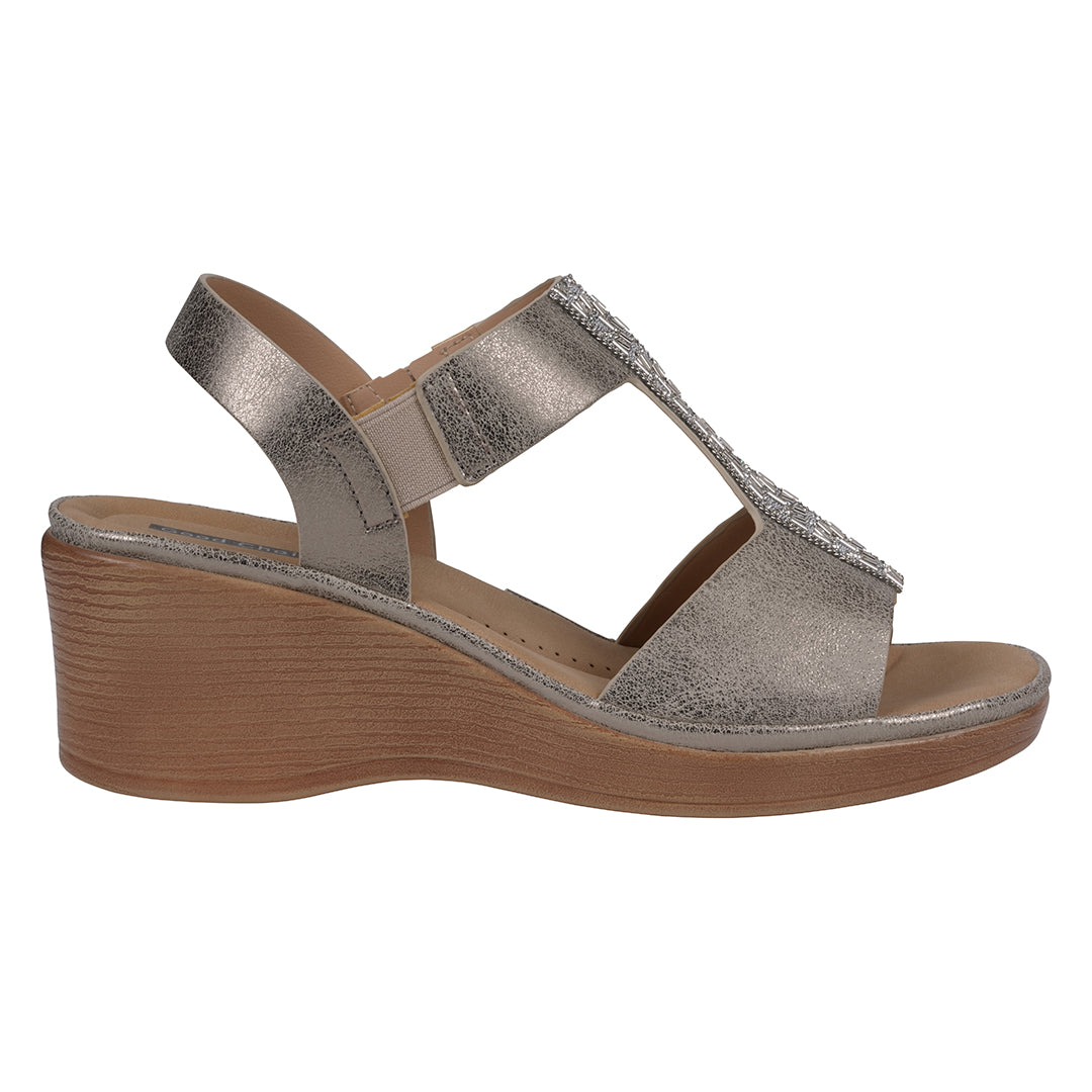 Silver wedge sandal on a white background