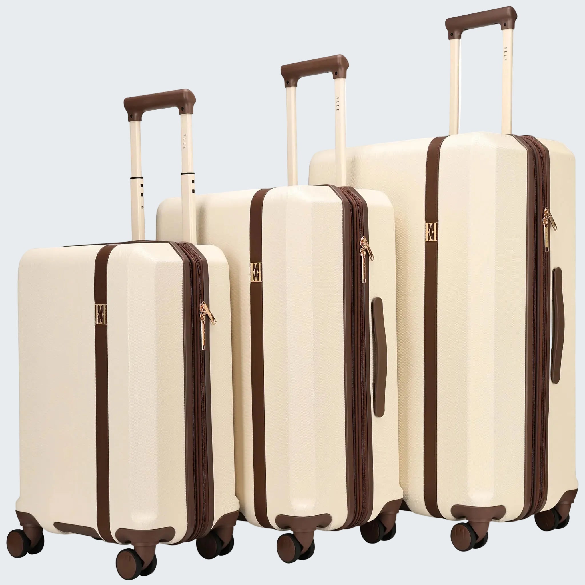 Set of three cream-colored suitcases with brown accents on a white background