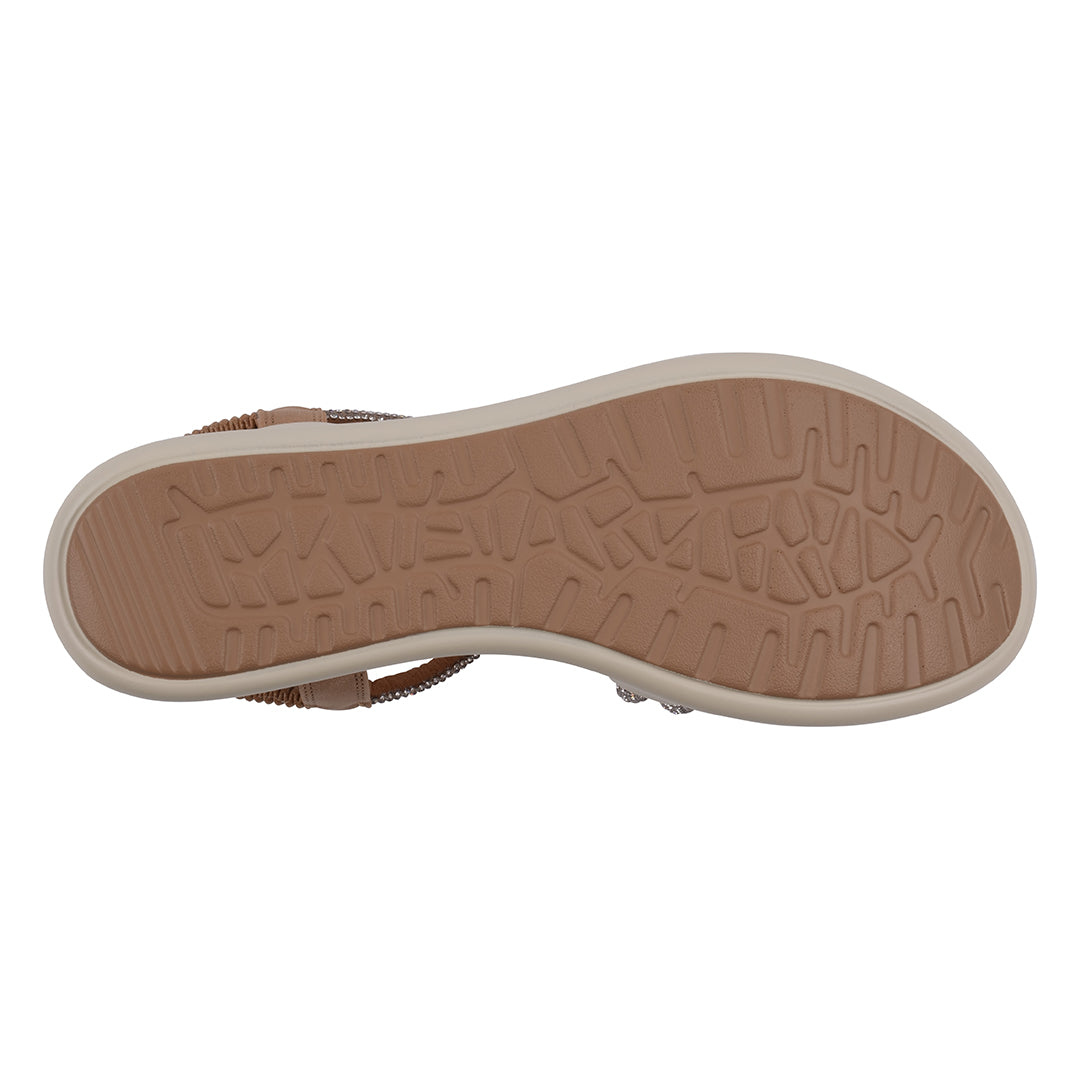 Close-up of a sandal sole with tread pattern on a white background