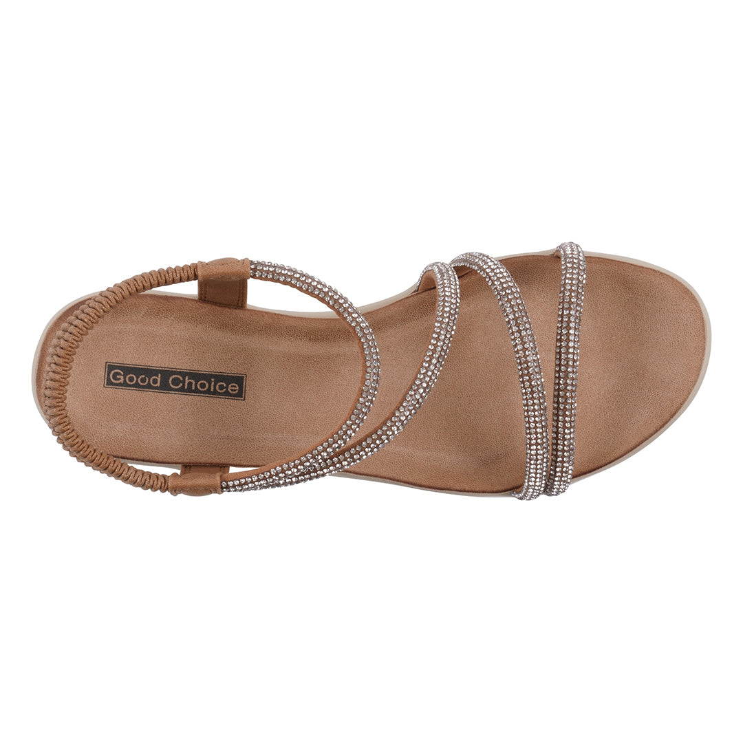 Tan sandal with rhinestone straps on a white background