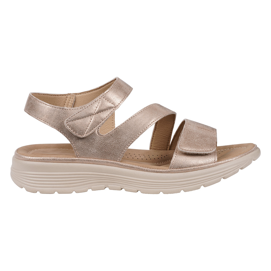 Beige sandal with multiple straps on a white background