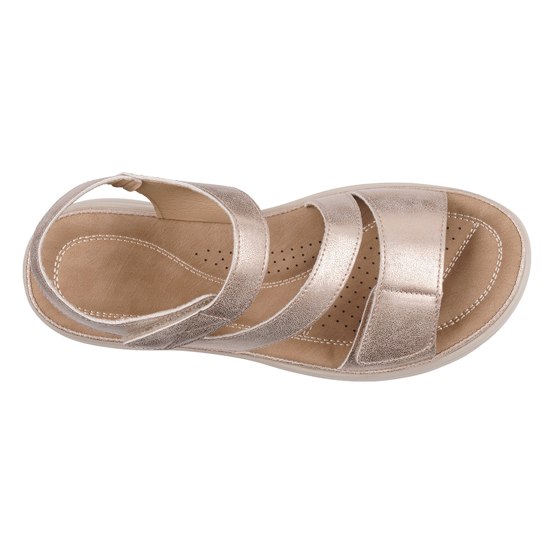 Gold sandal on a white background