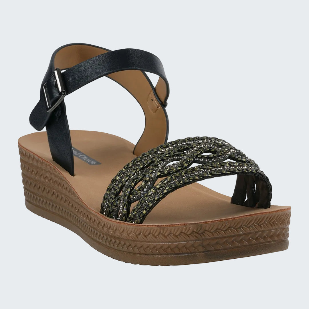 Black sandal with woven design on a white background