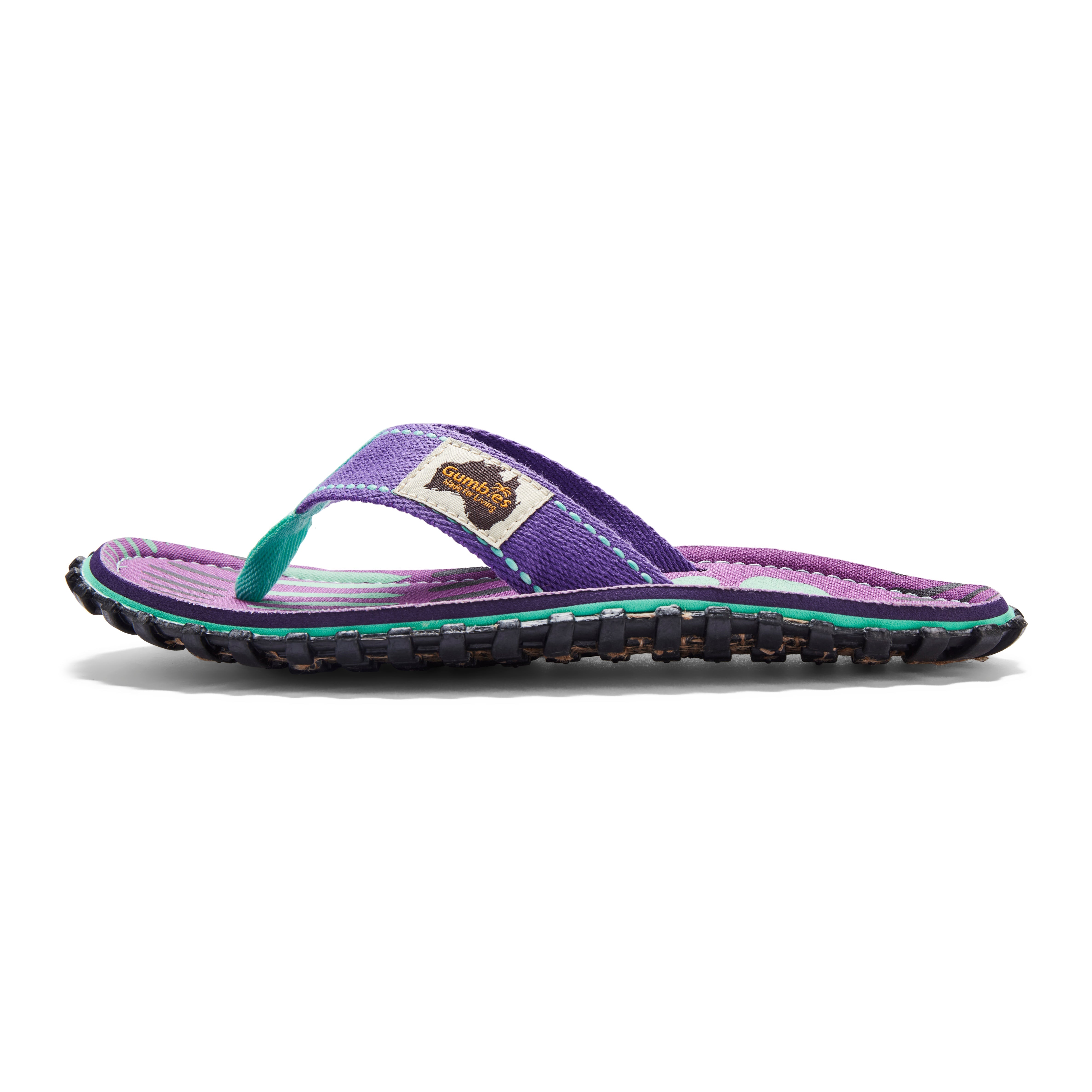 Purple sandal with a visible brand logo on a white background